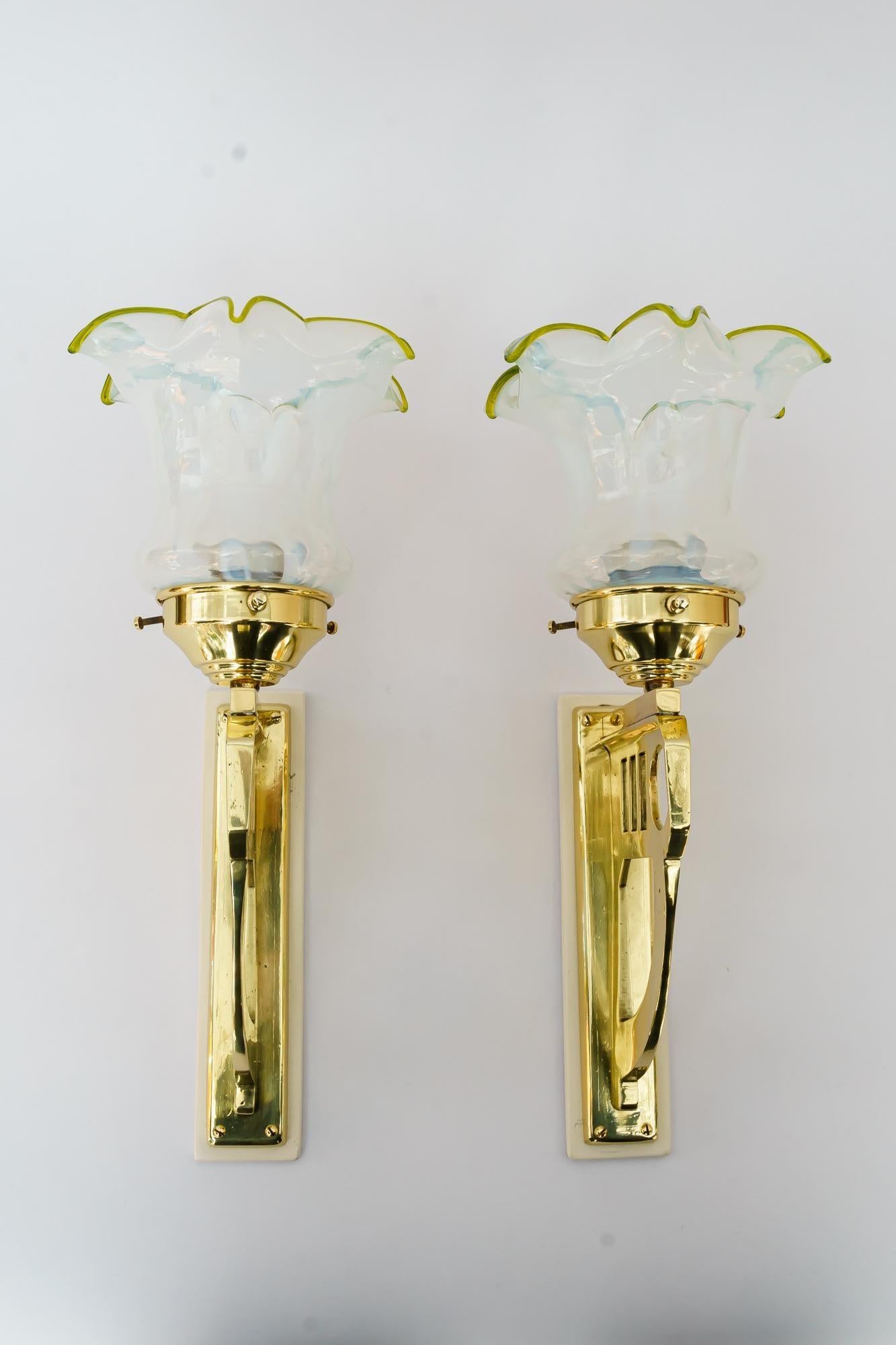 2 Art Deco wall lamps with original opaline glass shades vienna around 1920s
Brass polished and stove enameled
Original opaline glass shades.