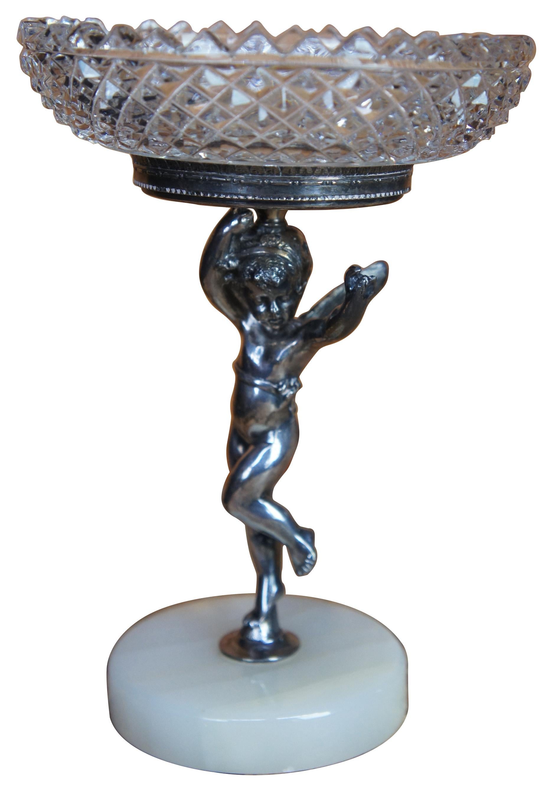 Pair of two antique Art Nouveau silver plate stands shaped like dancing fairies (instead of the usual wingless or angel-winged cherubs, these figures have dragonfly wings) on a white marble base and topped with cut glass compotes. Measure: 7