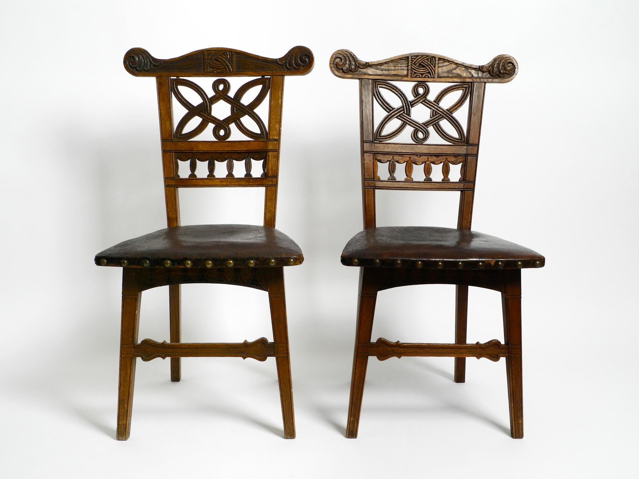 Two beautiful ornate Art Nouveau wooden chairs.
Probably made in France around 1900.
The original riveted leather seats are still on.
Great, very complex production with many beautiful details.
Chairs are also suitable as free-standing pieces of