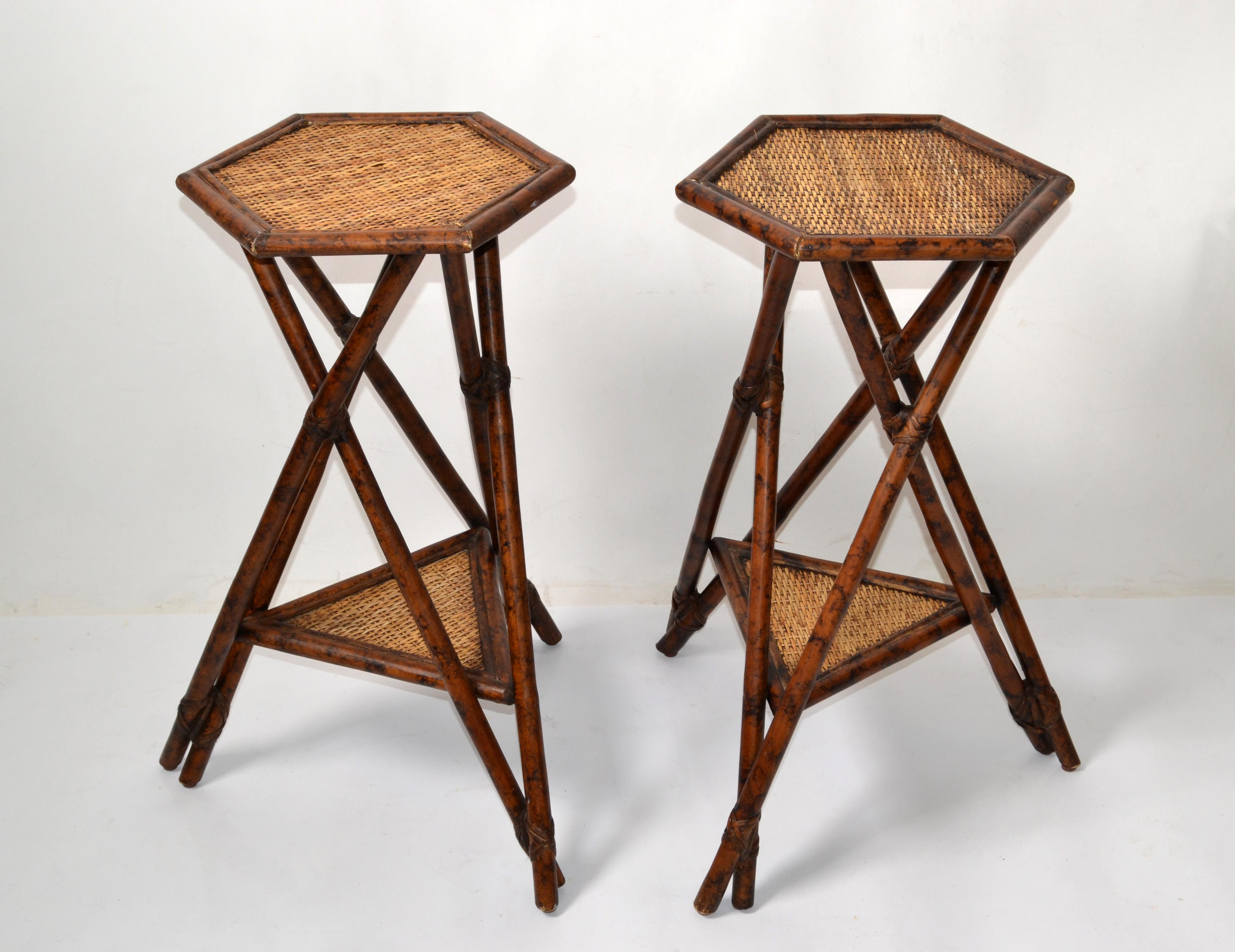 We offer a pair of Asian Modern handwoven octagonal tall wicker, rattan & bamboo 2 tier Drink Table, Pedestal, Side Table & Stands.
The Tripod Base is firmly linkt together with cane bindings. 
Great for your Florida sunroom.
Size of octagonal