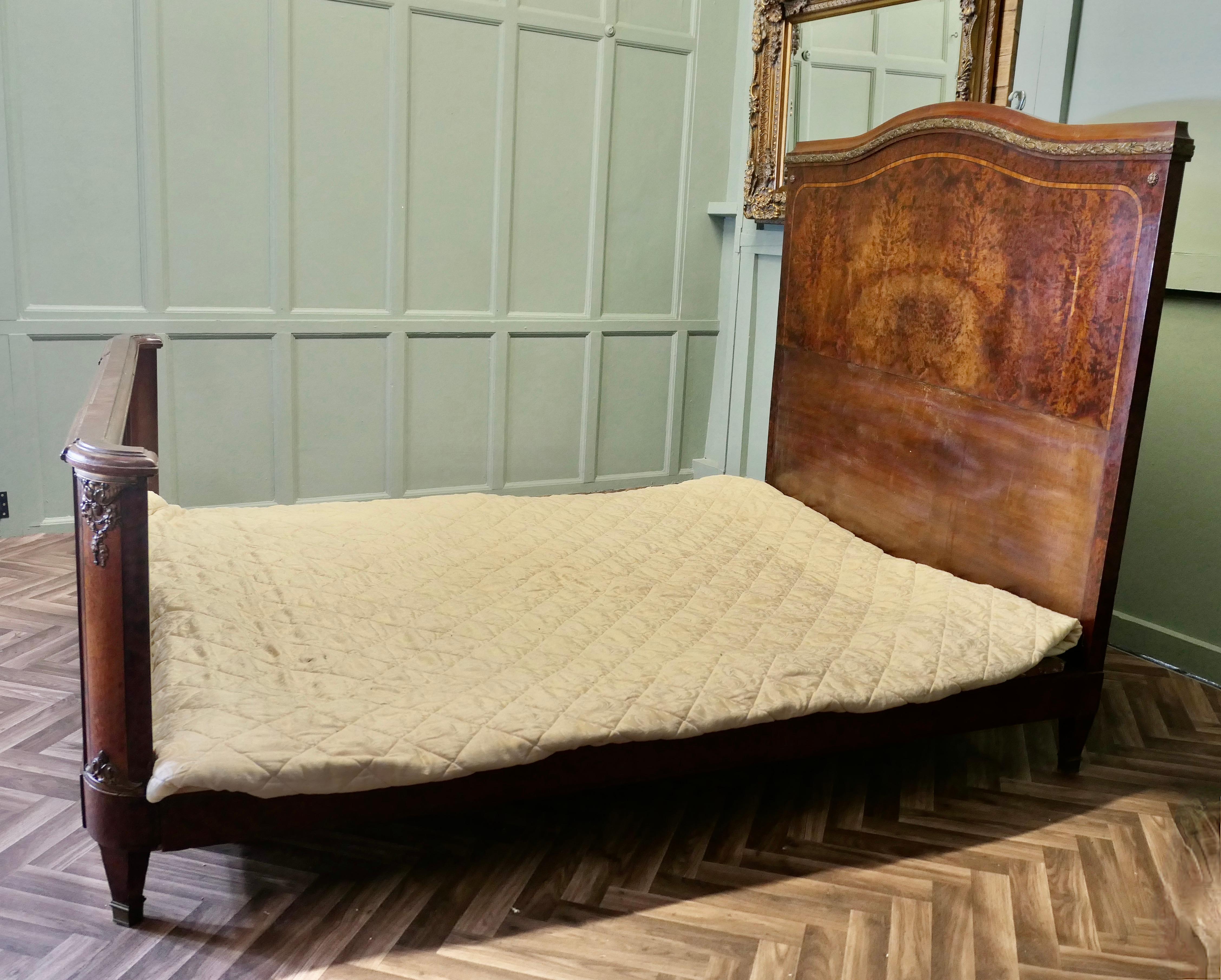 
French Empire Style Art Deco Bur Walnut 5ft Double Bed

This is a Superb French Empire Style Bur Walnut Bed, it has Ormolu Ribbon detailing along the top of the head board and at the corers with detailed walnut veneers
The bed is in good condition,