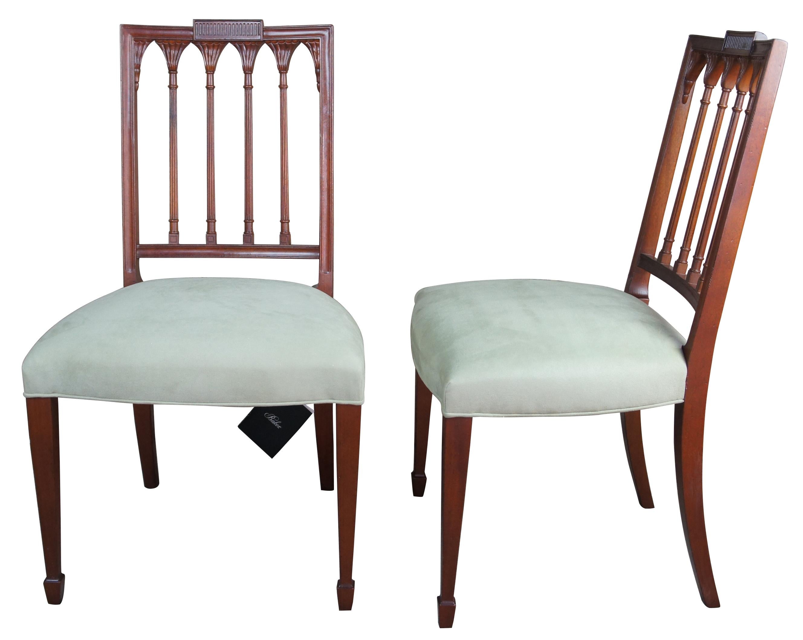 2 Baker Furniture Historic Charleston Russell dining chairs mahogany accent

Baker Furniture Historic Charleston Collection Russell side chairs. Sheraton style with neoclassical inspired back. Made from mahogany with tapered legs leading to spade