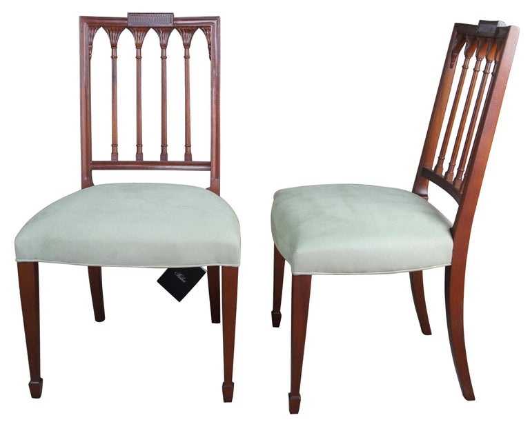2 Baker Furniture Historic Charleston Russell dining chairs mahogany accent

Baker Furniture Historic Charleston Collection Russell side chairs. Sheraton style with neoclassical inspired back. Made from mahogany with tapered legs leading to spade