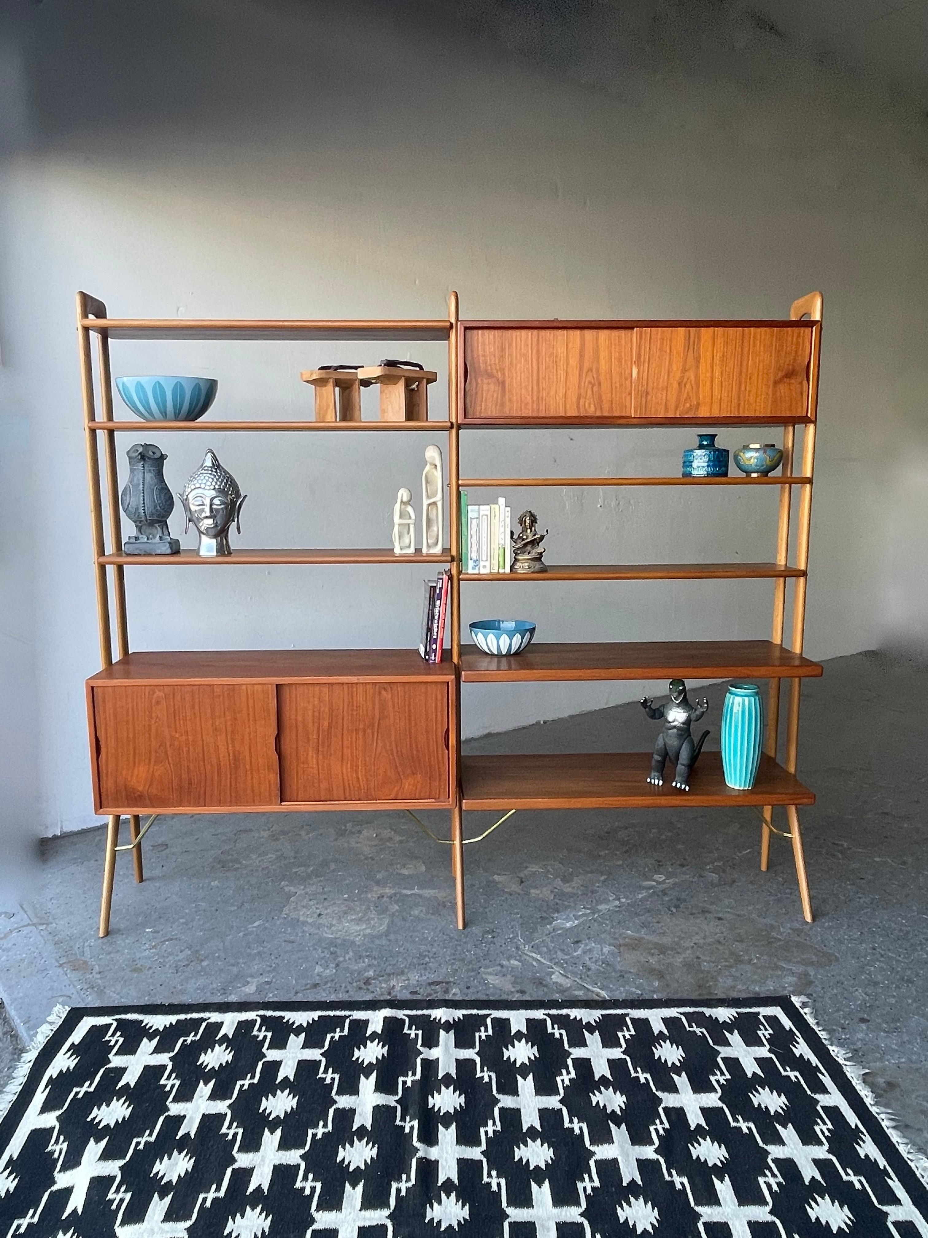 Wall unit or room divider by Kurt Ostervig for KP Mobler. Beautiful teak system is fully finished on the front and back, allowing for use as a room divider. It also modular can add or re-arrange shelves & cabinets , Gorgeous teak grain & sculpted