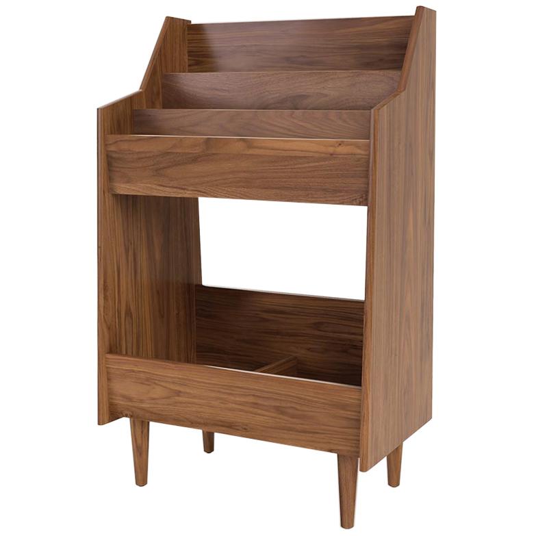 Luxe record stands elegantly display record cover art while providing easy access to as many as 350 records. All of our cabinets are hand-built in the United States from sustainably harvested solid ash and walnut, available in a range of finishes.