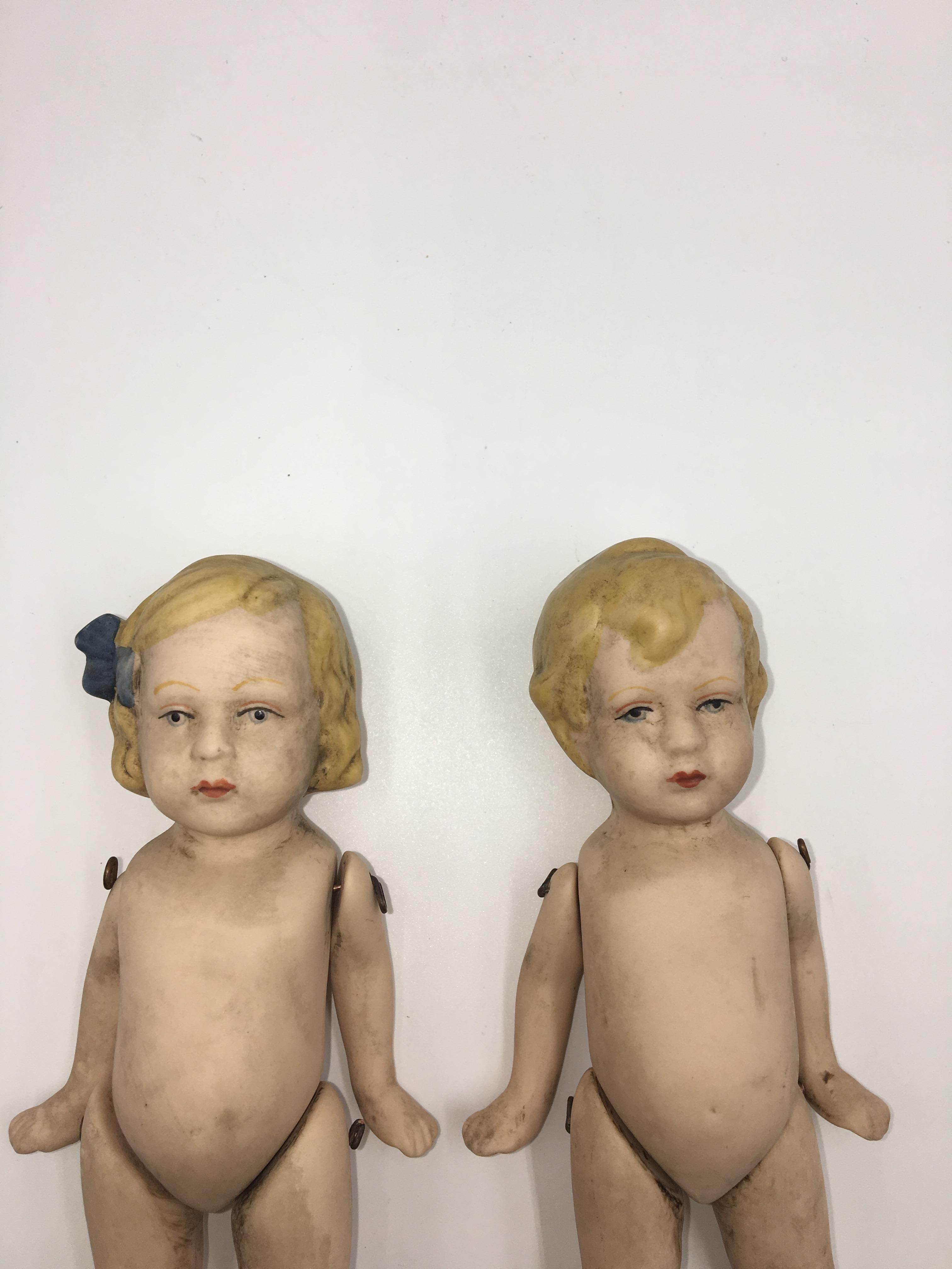 German 2 Bisque Dolls, Boy and Girl, circa 1930 For Sale