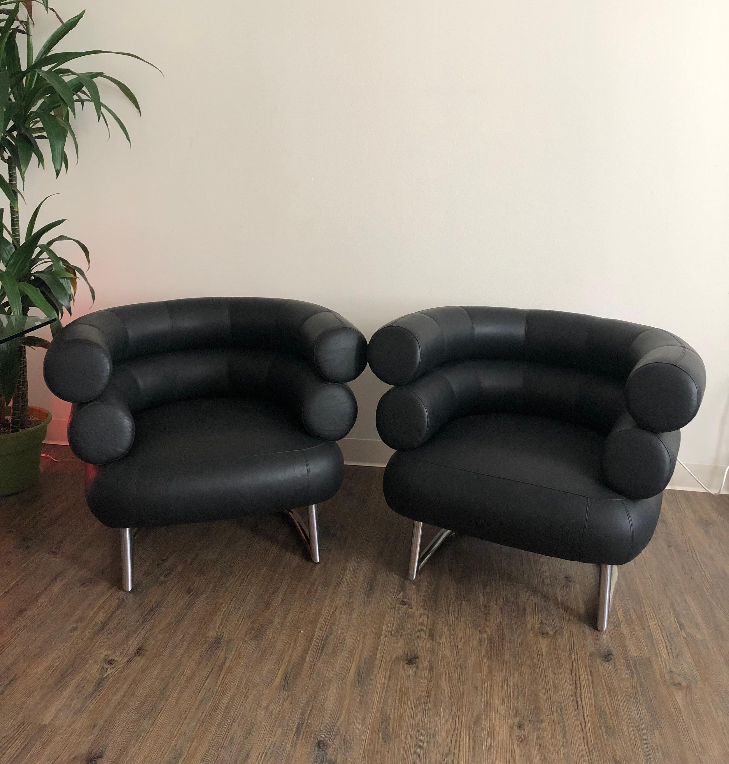 The BIBENDUM Chair:  Is A Design by Eileen Gray 1926 / 1927.
This Listing Is For 2 Black Leather BIBENDUM CHAIRS 1980s. The BIBENDUM ARMCHAIR Is An Art Deco Design by Eileen Gray.
Gray Used This Design Piece In Many Of Her Interior Projects.  Eileen