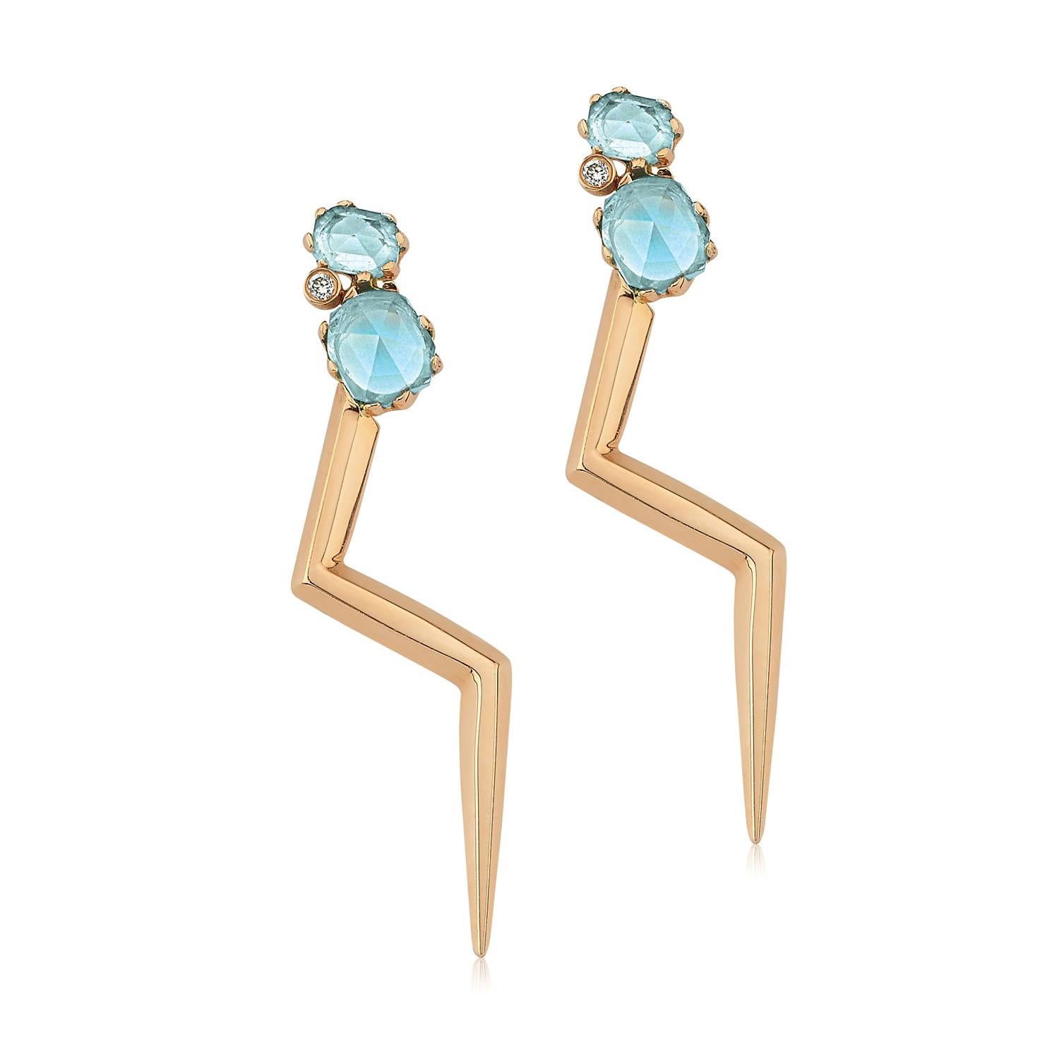 The Thunder Collection represents the power within yourself as the lightning design has always had a deep and strong meaning in history and legends. 

2 Blue topaz lightning earring with white diamond (single) in 14k rose gold by selda