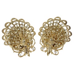 2 brass and glass  Peacock wall-sconces in Hollywood regency sytyle