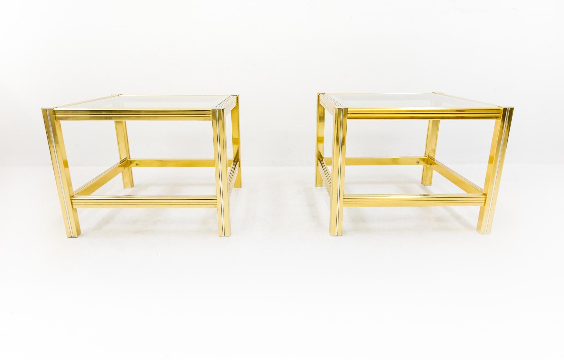 Two brass side tables. Comes with the original glass tops. Brass and chrome color.
Very nice side tables. Nightstand tables. Very good condition. Maison Jansen style.