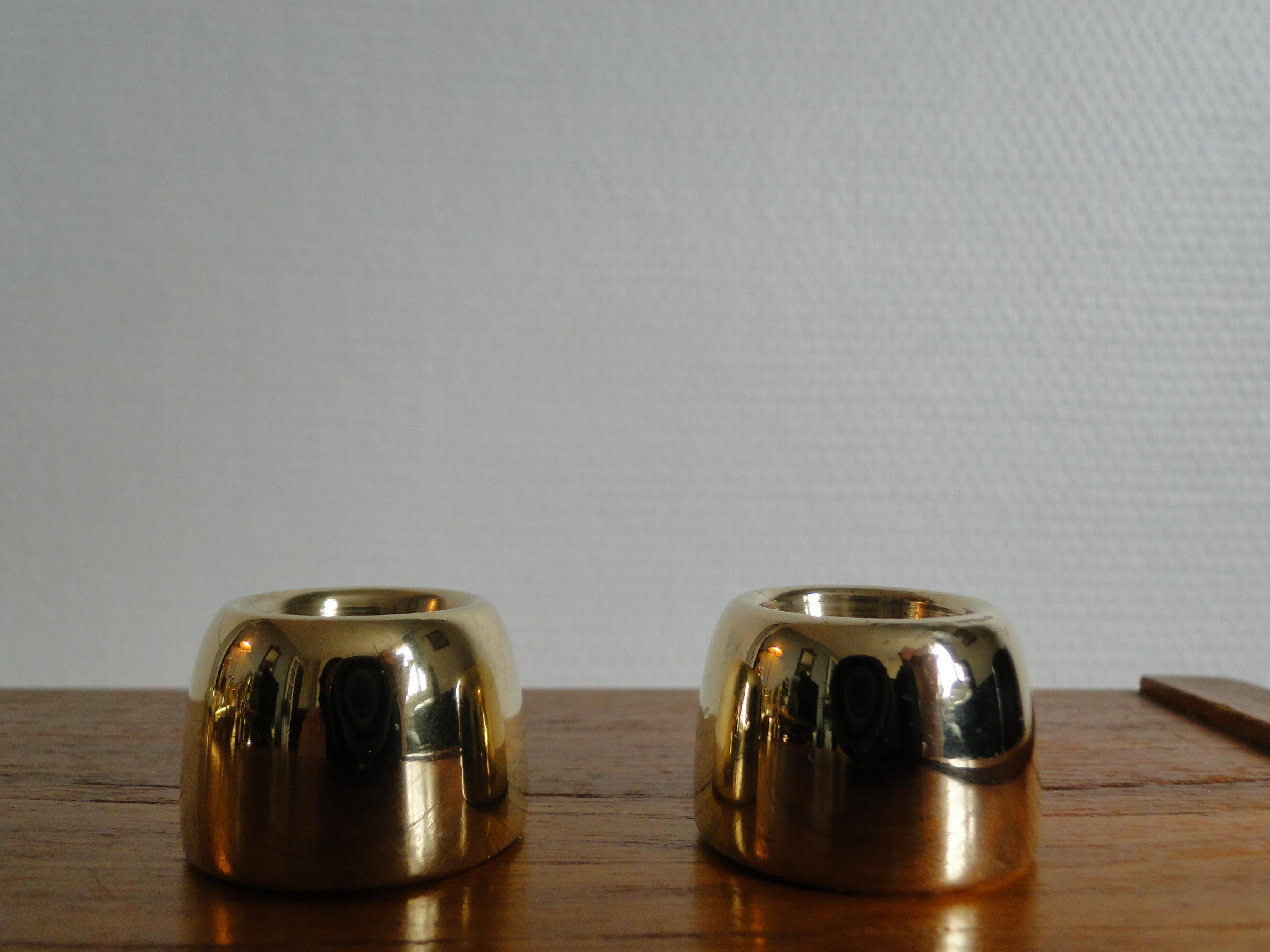 Set of 2 model L97 brass candlesticks by Hans Agne Jakobsson for Markaryd, Sweden, 1960s, in good condition.