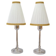 2 lampade da tavolo art deco in ottone nichelato con paralumi in tessuto vienna 1920 circa