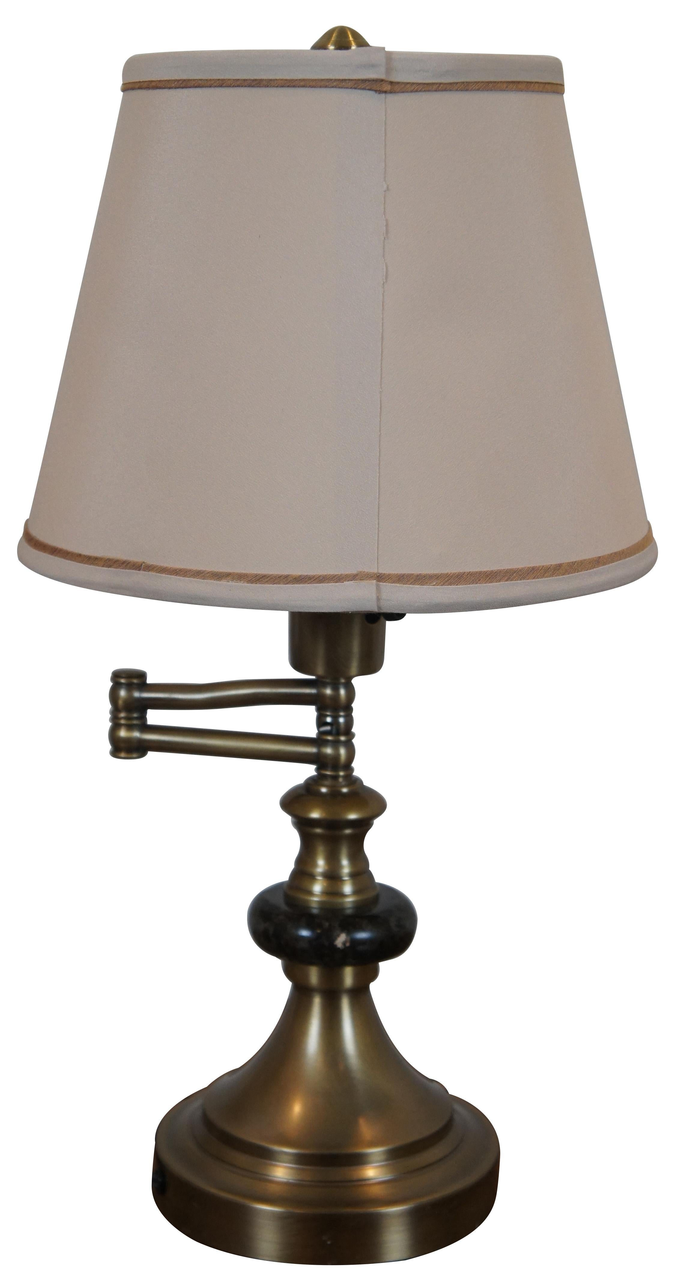 Pair of vintage brass and faux marble swing arm table lamp with off white shades, imported for Fred Meyer.

6.25” x 20.5” / Shade - 11.25” x 8.5” / Width with Arm Extended – 11” (Diameter x Height)
