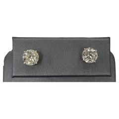 2 Brilliant Cut Diamond Studs Color "I-J", Clarity Clarity SI3 4.04cts