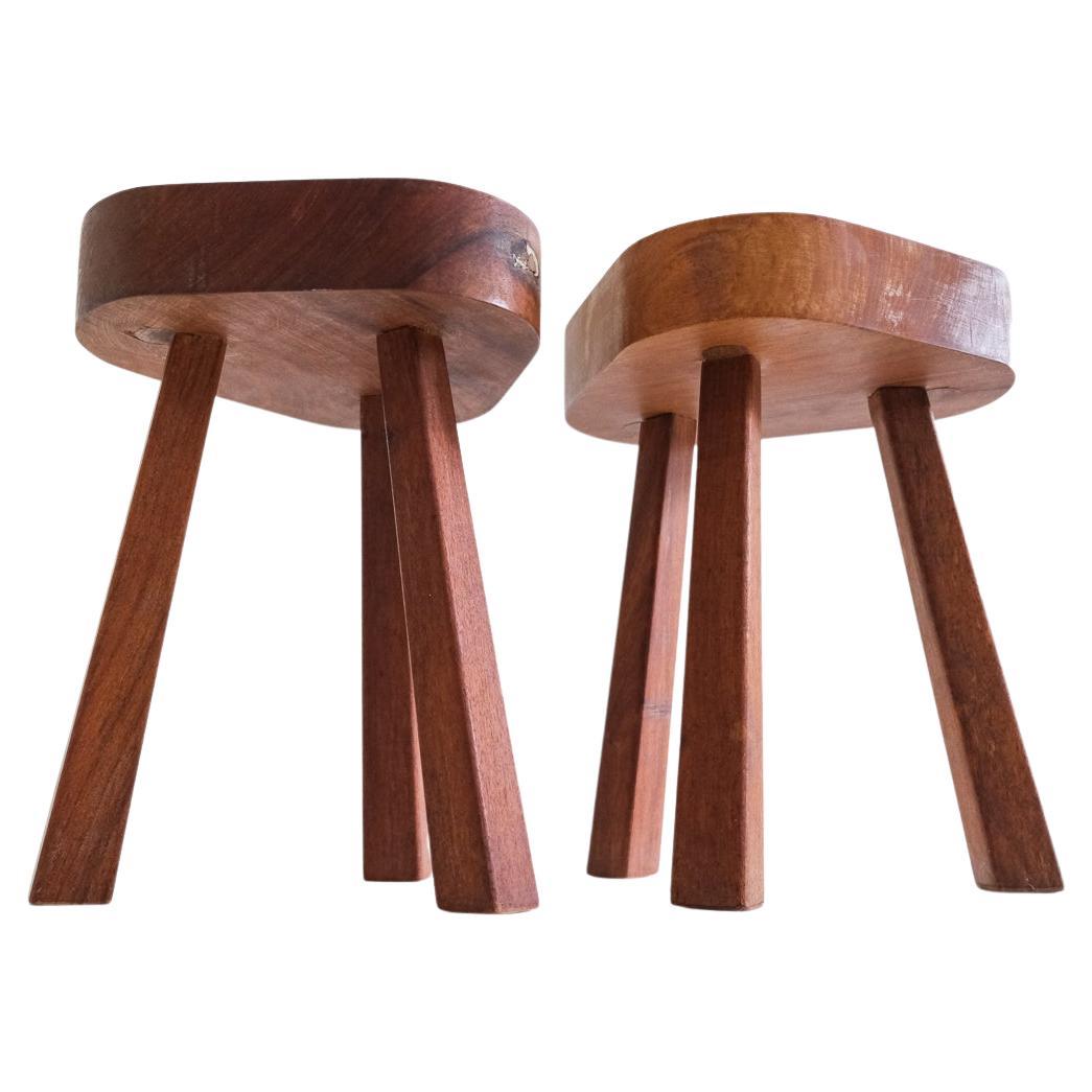2 brutalist stools or sidetables of solid wood in the style of Chapo or Perriand