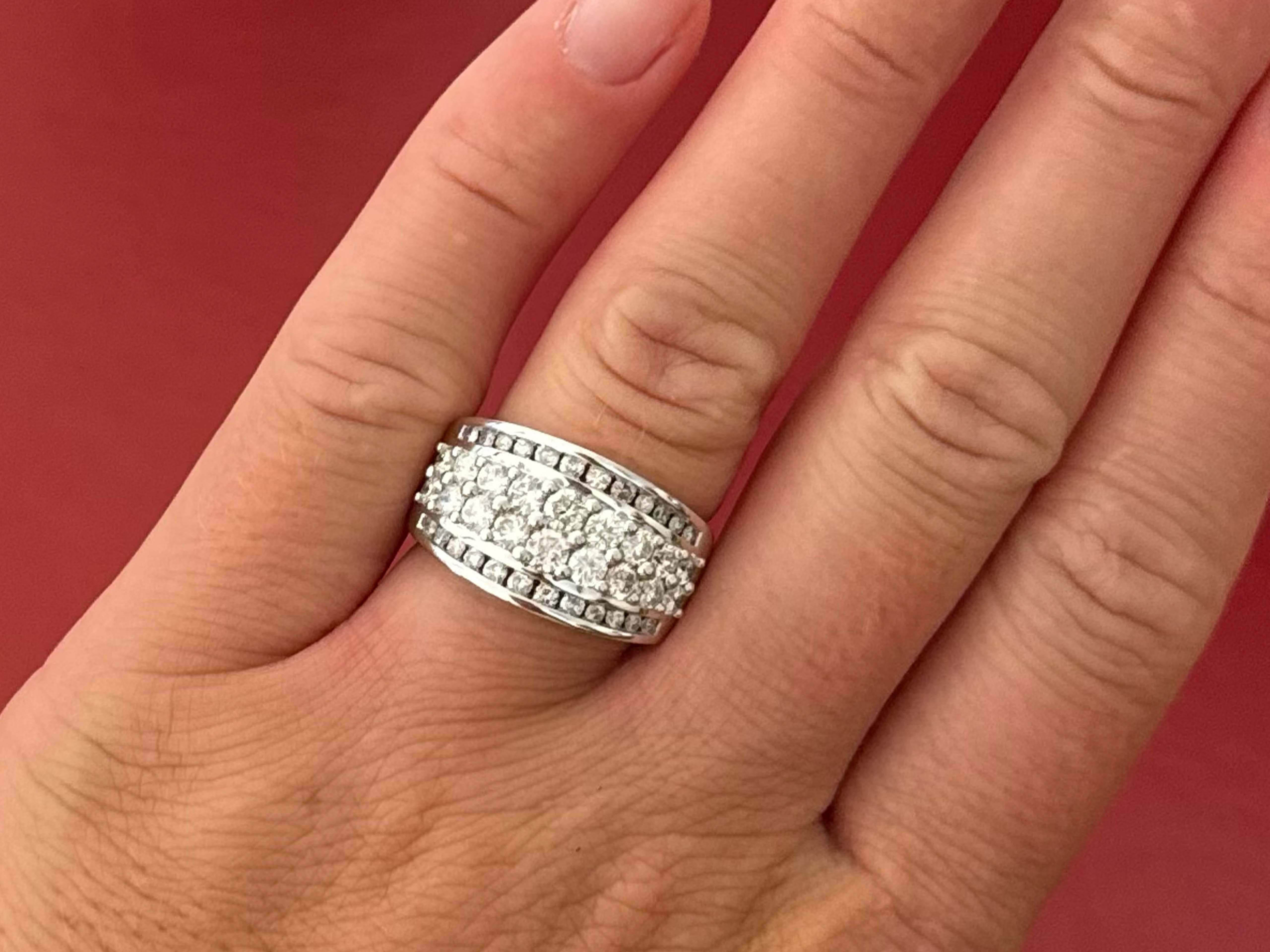 Item Specifications:

Metal: 14k White Gold

Diamond Count: 42 brilliant cut

Total Diamond Carat Weight: ~2.00 carats 

Diamond Color: G-H

Diamond Clarity: SI2-I1

Ring Size: 7.25
​
​Ring Height: 12.5 mm 

Total Weight: 9.0 Grams

Stamped: