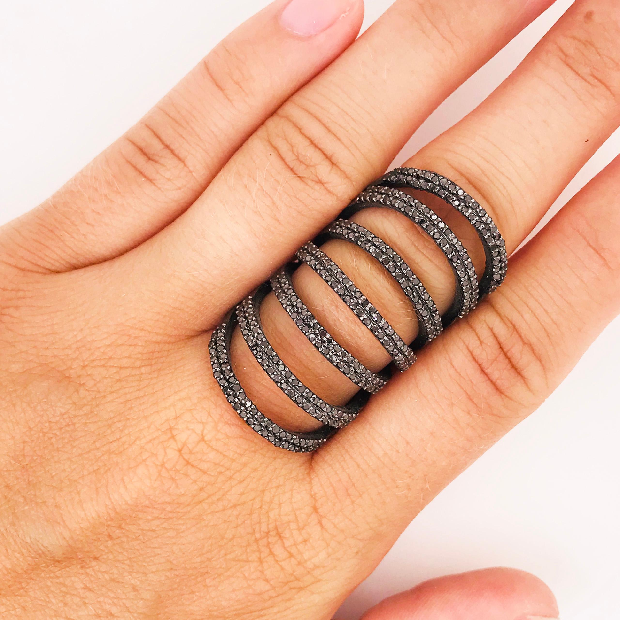 The long knuckle statement ring with 2 carats of black diamonds is an amazing way to wear black!  It goes with every black item that you have in your wardrobe and is neutral enough that you could wear it with anything!  The metal is black rhodium