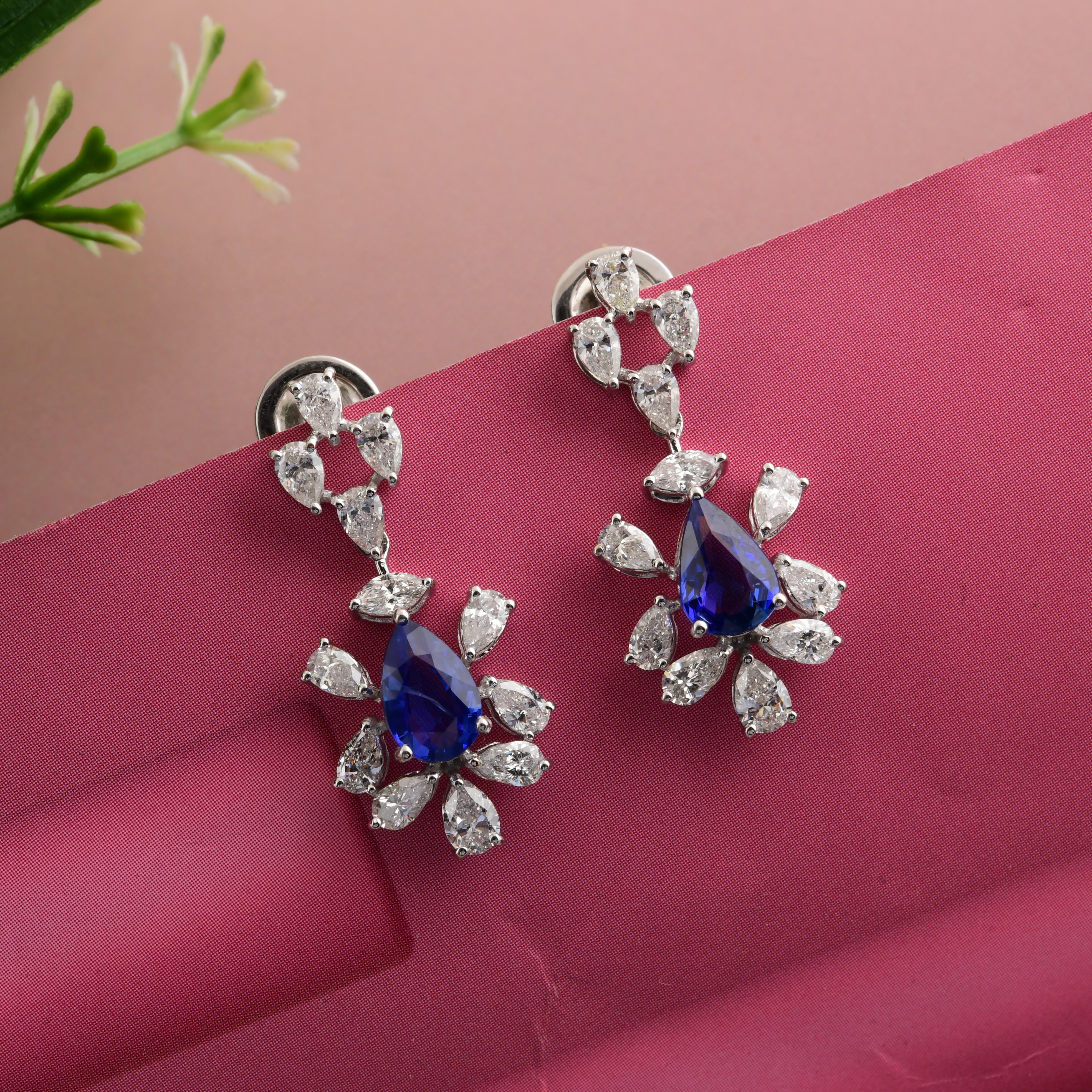 Cast from 18-karat gold, these exquisite earrings are handset with 2 Carat Blue Sapphire and 2.10 carats of sparkling diamonds.

FOLLOW SPECTRUM JEWELS storefront to view the latest collection & exclusive pieces. Spectrum Jewels is proudly rated as