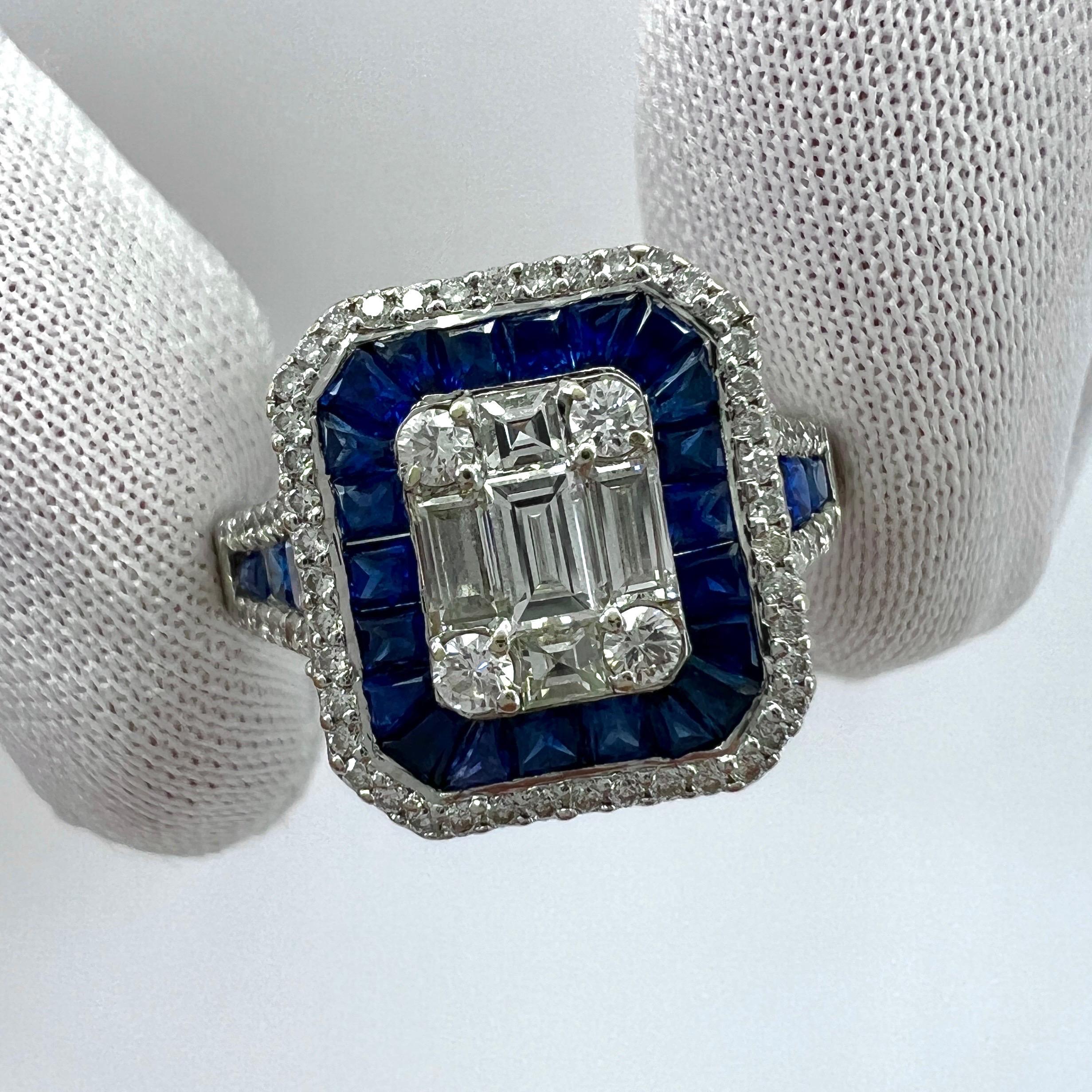 Natural Blue Sapphire & Diamond 18k White Gold Art Deco Cocktail Ring.

2.00 Carat total ring. Approx. 1 carat of calibre cut sapphires with deep blue colour and good to very good clarity. All cut and set in  a mystery invisible style setting.