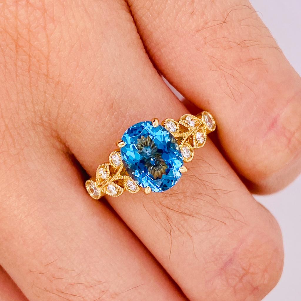En vente :  Bague en or jaune 14 carats avec zircon bleu et diamants inspirée de la Nature 2