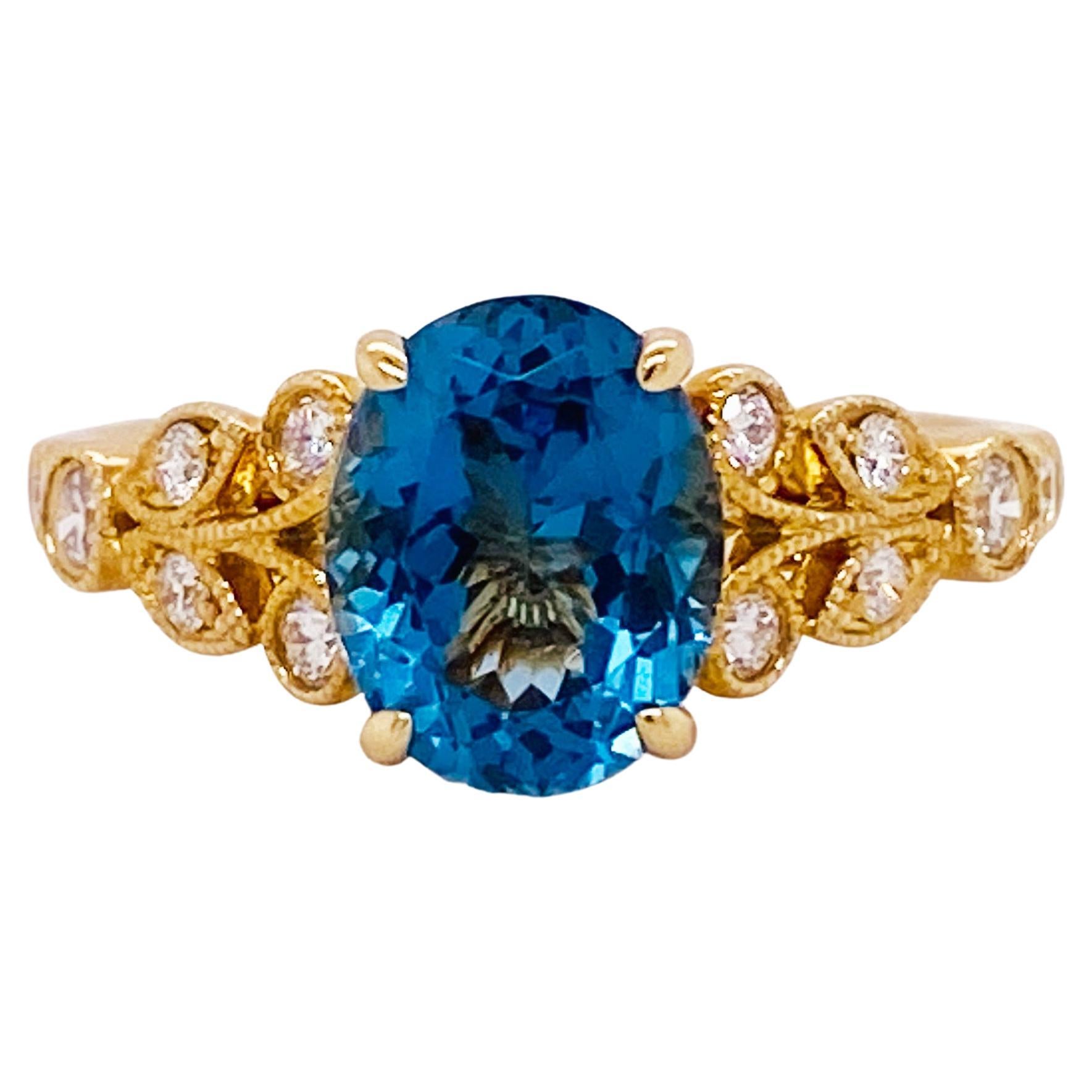 Bague en or jaune 14 carats avec zircon bleu et diamants inspirée de la Nature en vente 1