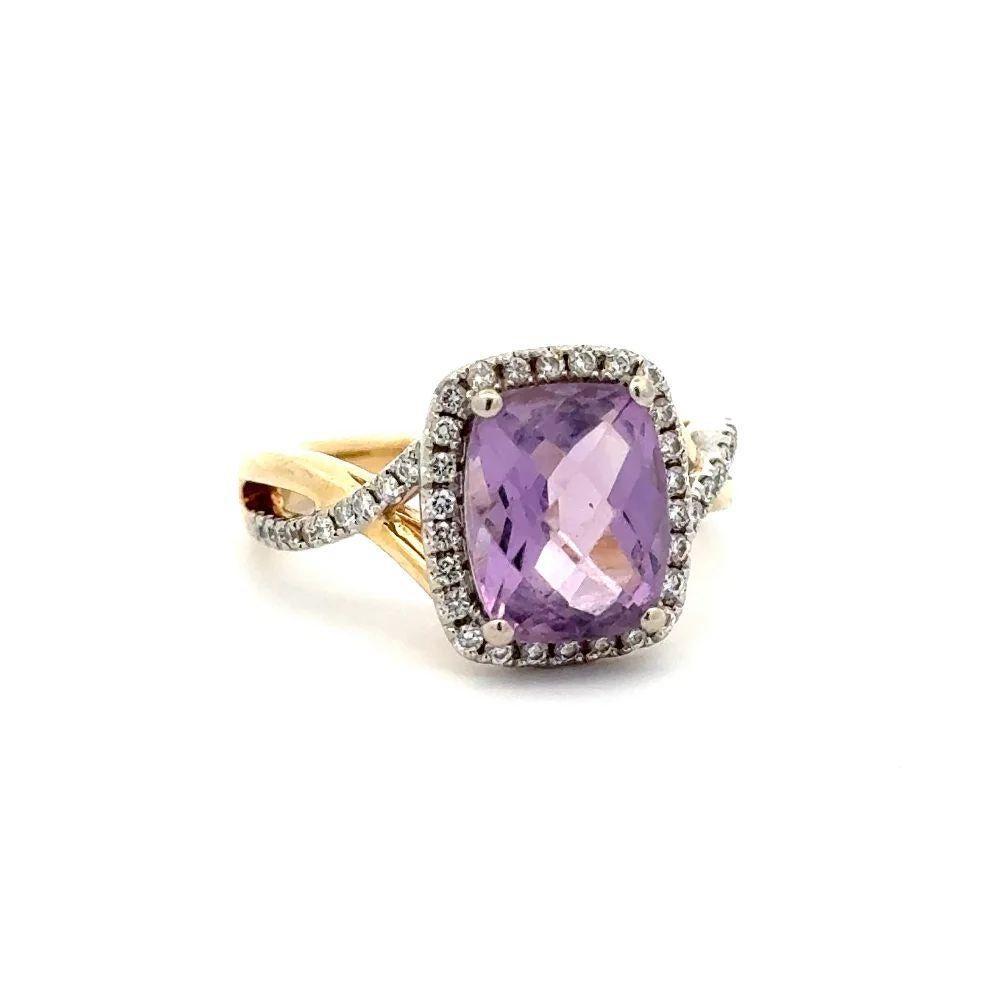 Simply Beautiful! Finely detailed Amethyst and Diamond Cross Over Gold Cocktail Ring. Centering a Hand set securely nestled 2 Carat Checkerboard Amethyst. Surrounded by High-quality Diamonds, weighing approx. 0.45tcw, including sides and on split