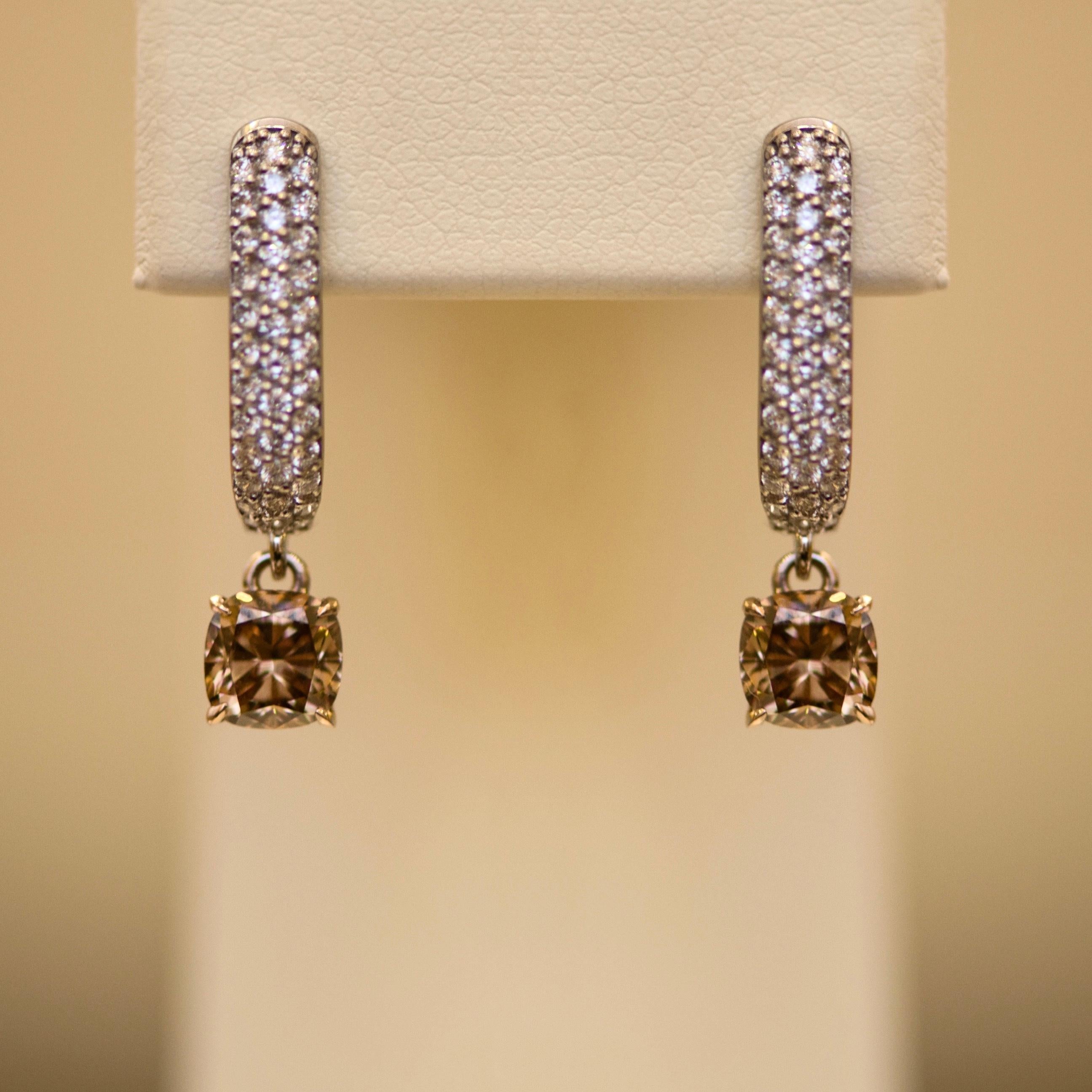 Diamond is the best choice if you are looking for something that will be glittering and very attractive. Also diamonds are rare, valuable, and, by the way, the most popular stones in the world. This earrings - idea for the present for yourself. 
The