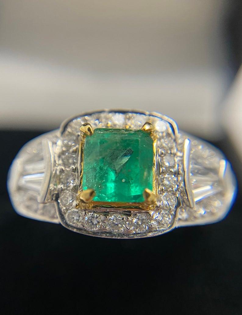 Emerald Cut 2 Carat Colombian Emerald, Baguette-Cut Diamonds, and 18 Karat White Gold Ring For Sale