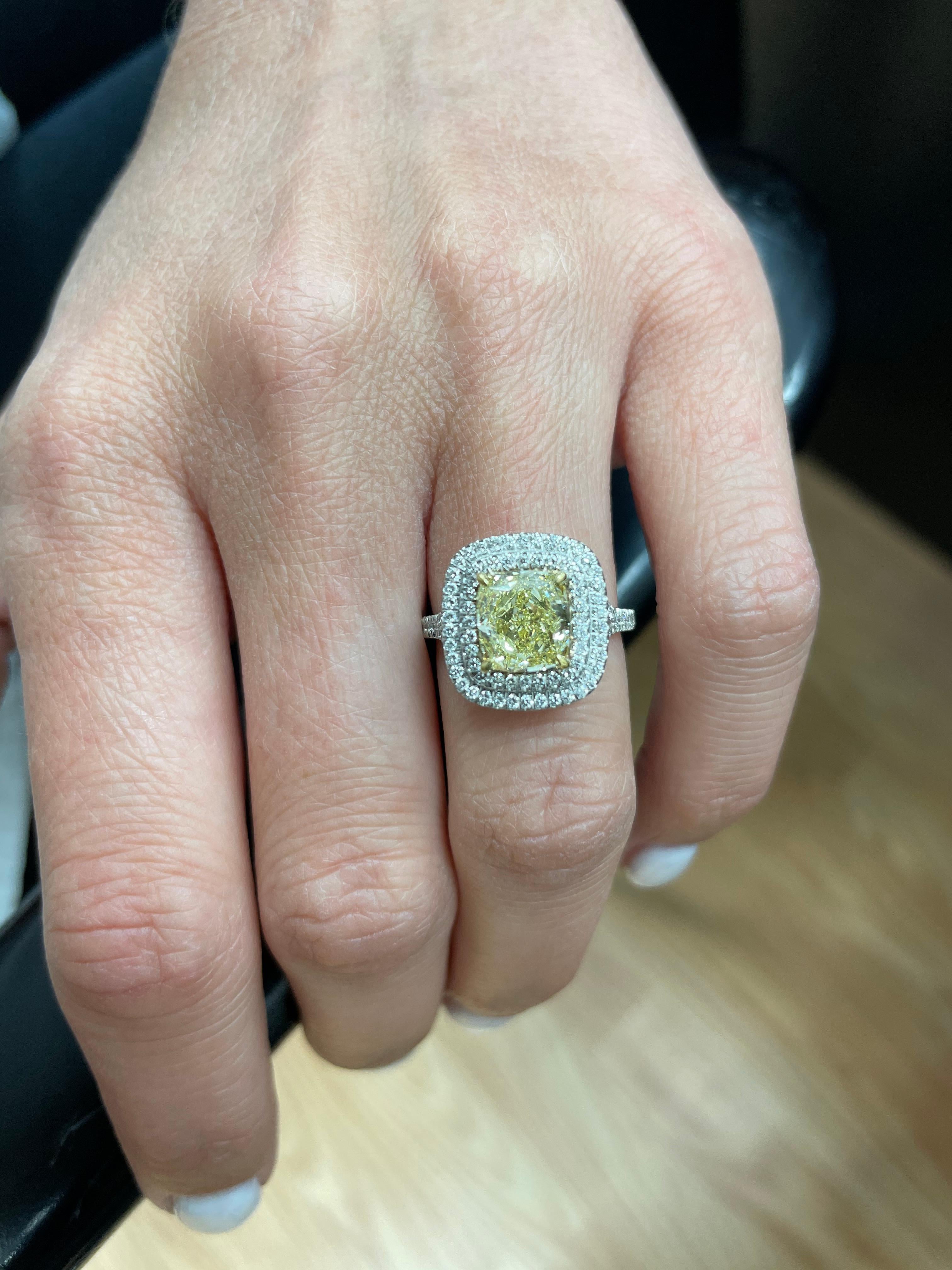 2 Carat Cushion Cut Fancy Yellow Diamond Double Halo GIA Engagement Ring In New Condition For Sale In New York, NY