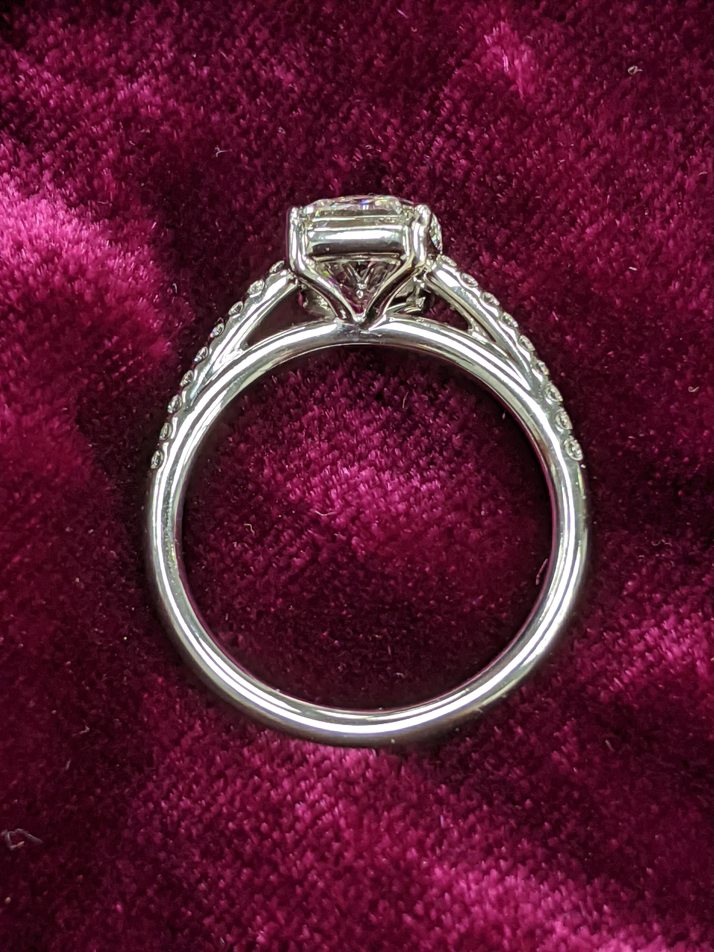 2.03 ct Cushion Modified Brilliant with G color and VVS-1 clarity (GIA certificate upon request) mounted on an 18KT white gold solitaire-style mounting.  18 small diamonds (0.14 ct) stud the front of the mounting.

Crafted in the heart of NYC's
