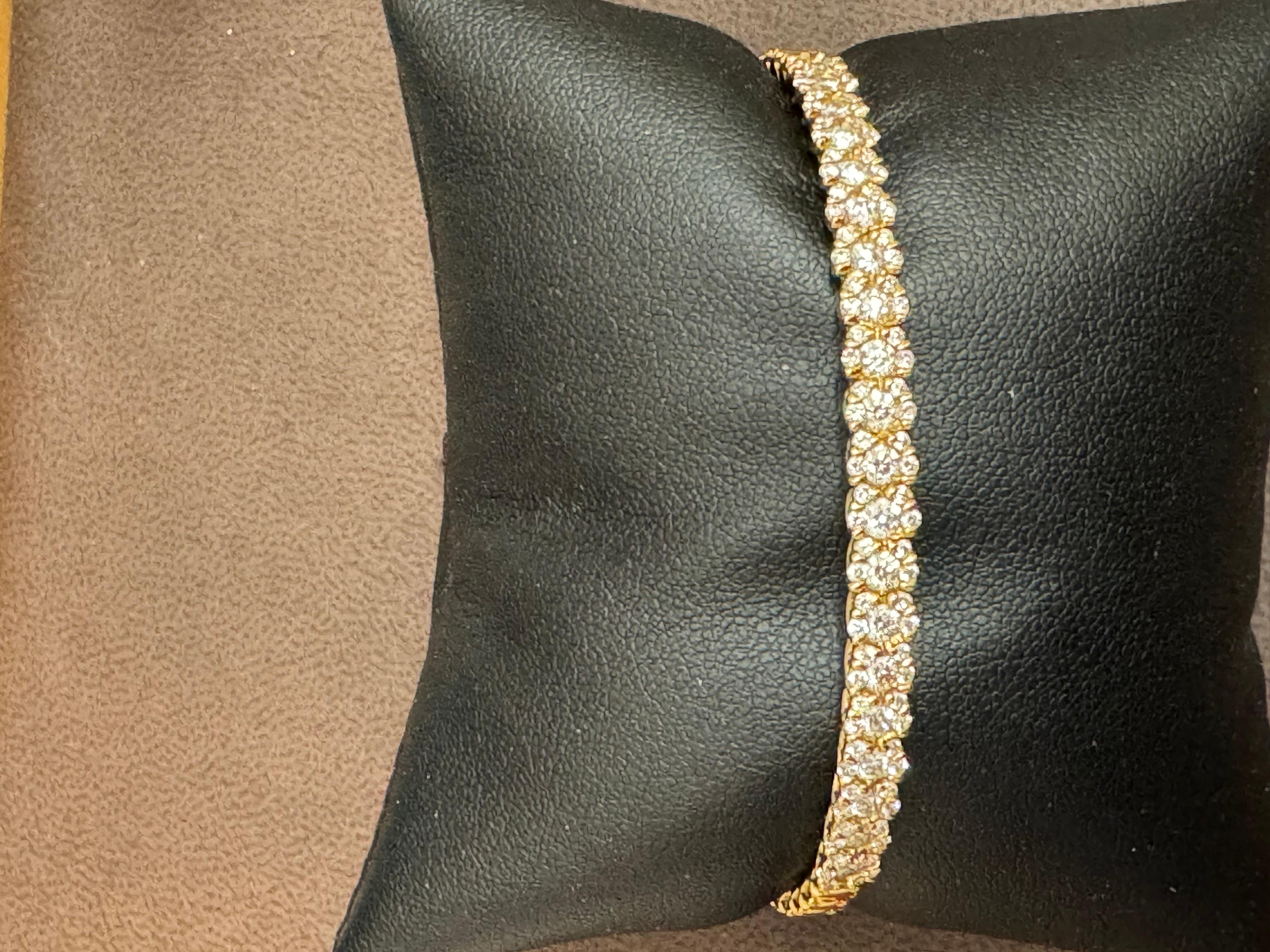 Diamants de 2 carats  Bracelet jonc en or jaune 18 carats 20 grammes, signé SGJ en vente 1