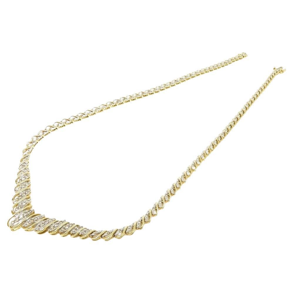 Découvrez l'élégance exquise de ce collier de diamants, d'un poids total de 2 carats. D'une longueur de 17,5 pouces et d'une largeur de 4 à 11 mm, son éclat est accentué par le poinçon JAFA de 14k. Fabriqué avec 24 grammes de matériaux nobles, ce