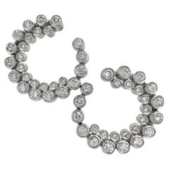 Boucles d'oreilles en platine à double spirale avec diamants de 2 carats