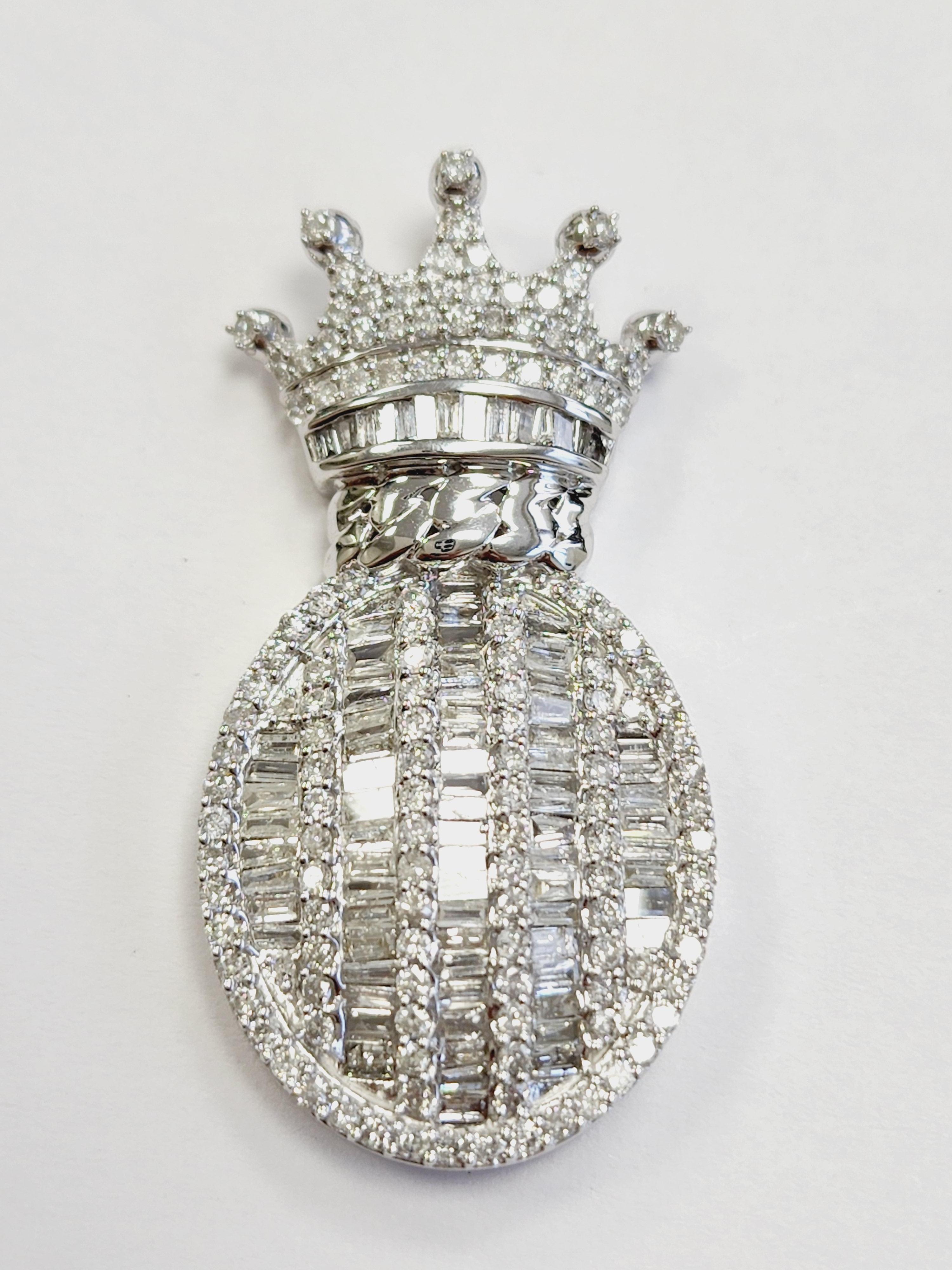 Beautiful shiny, 2 cttw Pineapple Shape Pendant 14 Karat White Gold. average Color H-I, Clarity SI-I.
Channel Set of Baguettes and Round Natural Diamonds. (Pendant Only)
Measurement 1.50 inch long x 0.75 inch wide x 0.25 inch height