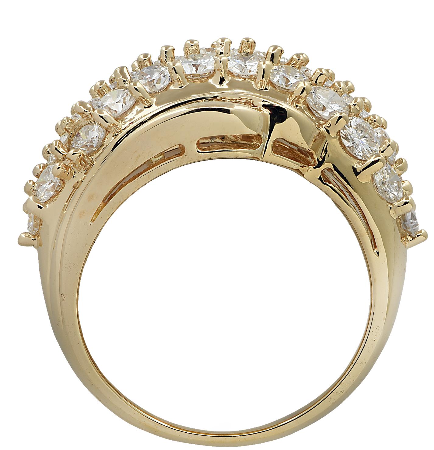 Gorgeous ring crafted in 18 karat yellow gold featuring 59 mixed round brilliant cut diamonds and baguette diamonds weighing approximately 2 carats total, F-G color, VS-SI clarity. This beautiful ring measures .5 of an inch at its widest part. It is
