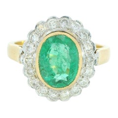 Anillo de oro de 14 quilates con esmeralda de 2 quilates