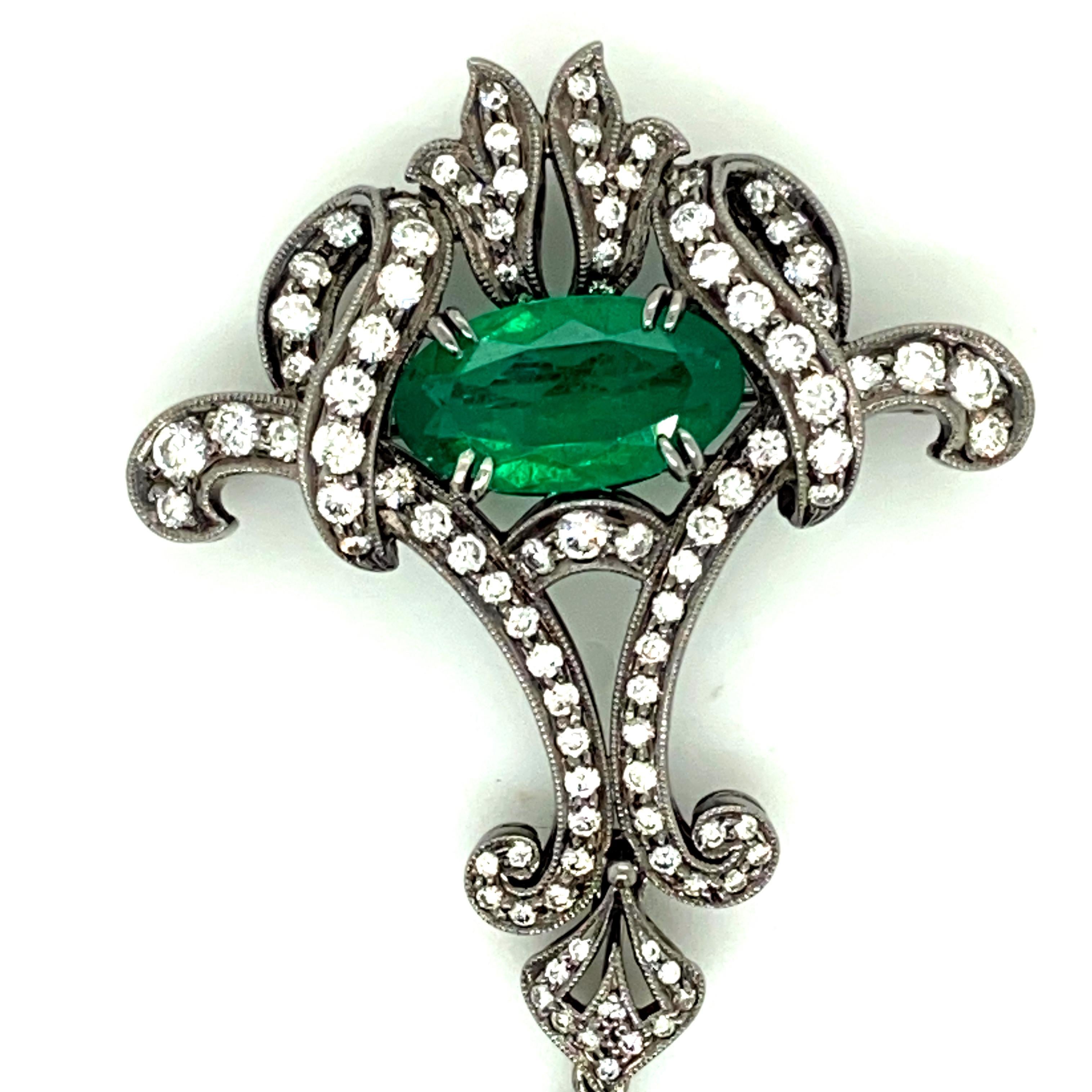 Contemporary Oval Shaped Emerald Cts 2.16 and Round Diamond Platinum Antique Brooch For Sale
