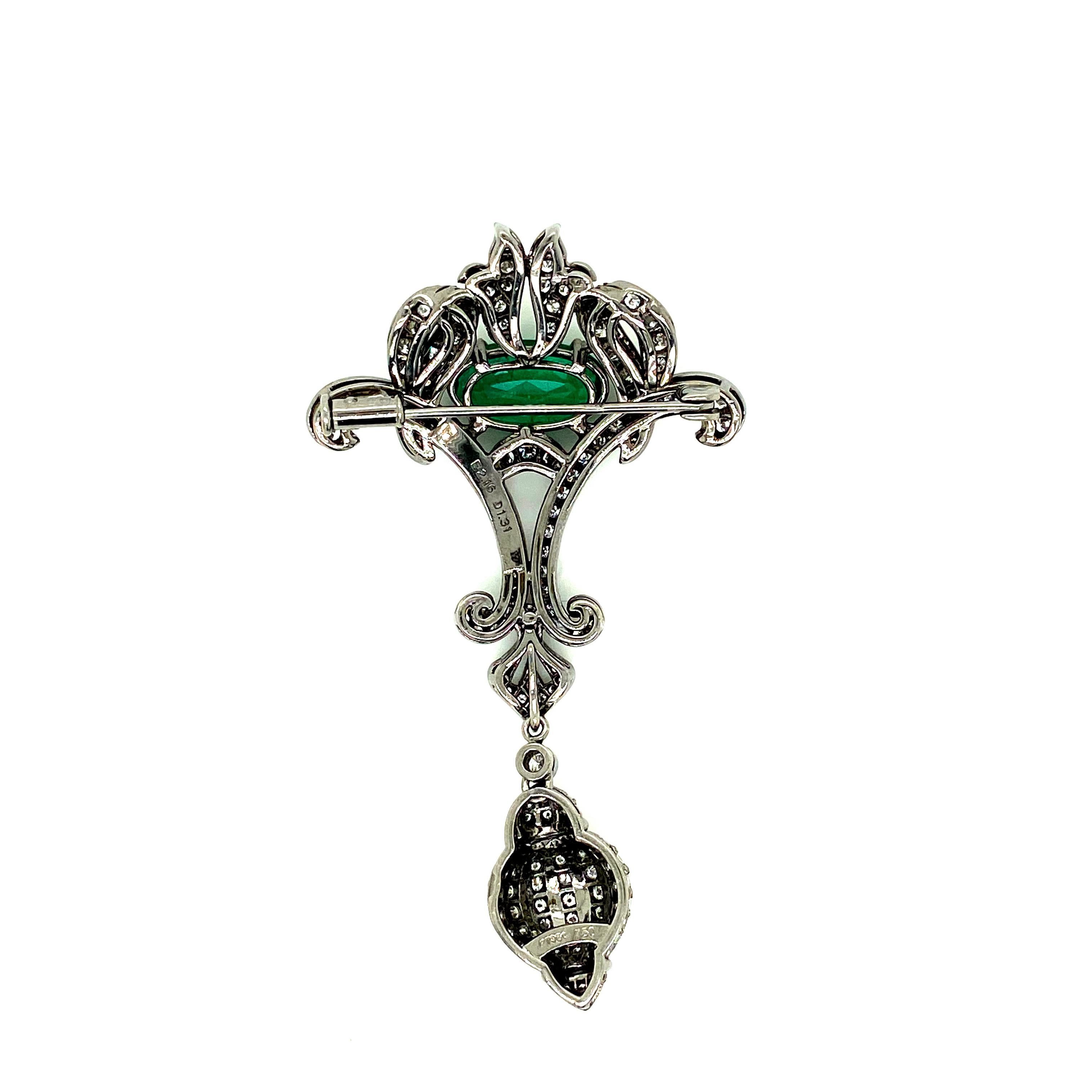 Oval Shaped Emerald Cts 2.16 and Round Diamond Platinum Antique Brooch In New Condition For Sale In Hong Kong, HK