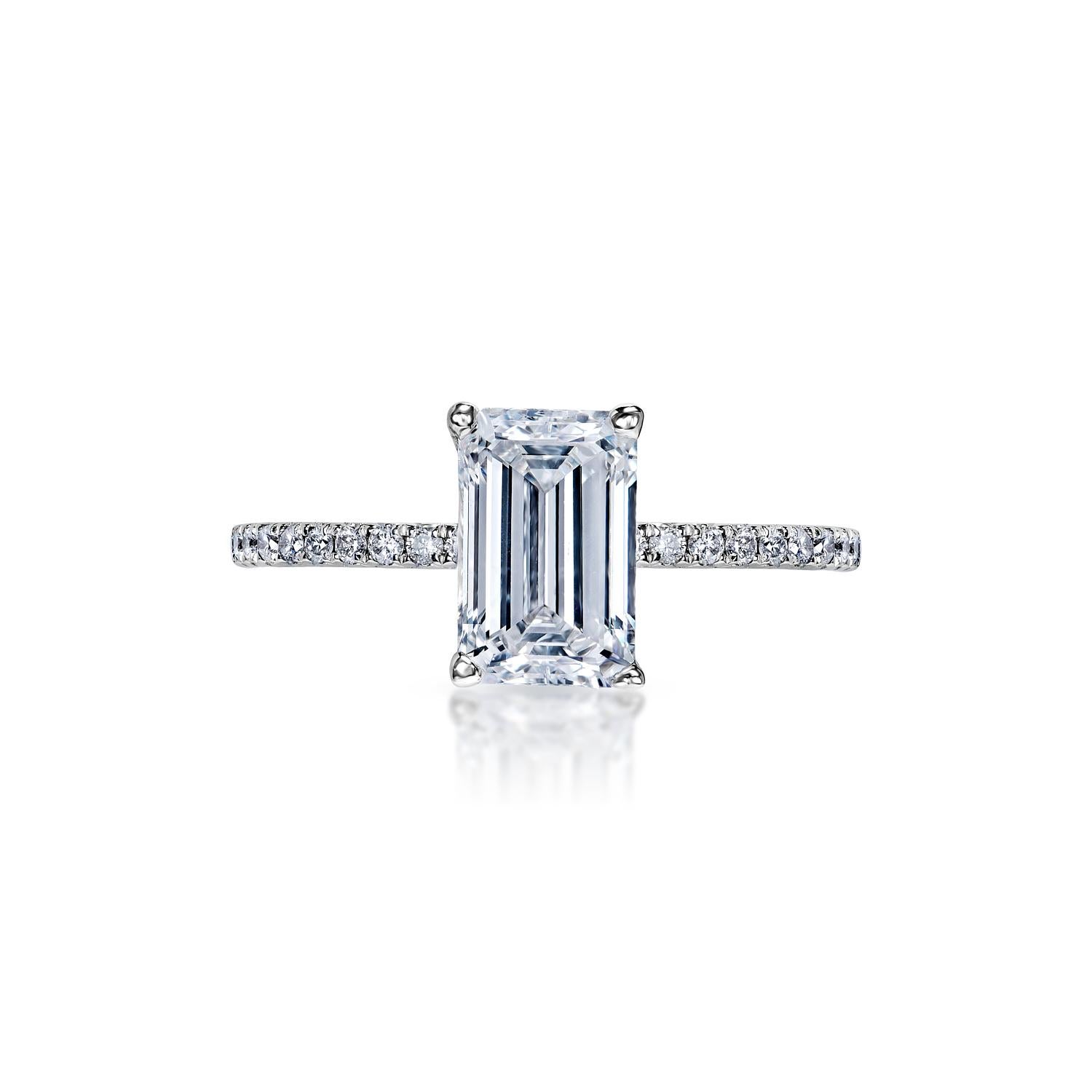 Mariam 2 Carat E VS1 Emerald Cut Diamond Engagement Ring in 18k White Gold by Mike Nekta

Center Diamond:

Carat Weight: 1.50 Carat
Color : E
Clarity: VS1*
Style: Emerald Cut
Feather Filled- Spl Care Req'd

Ring:
Metal: 18 Karat White Gold
Setting: