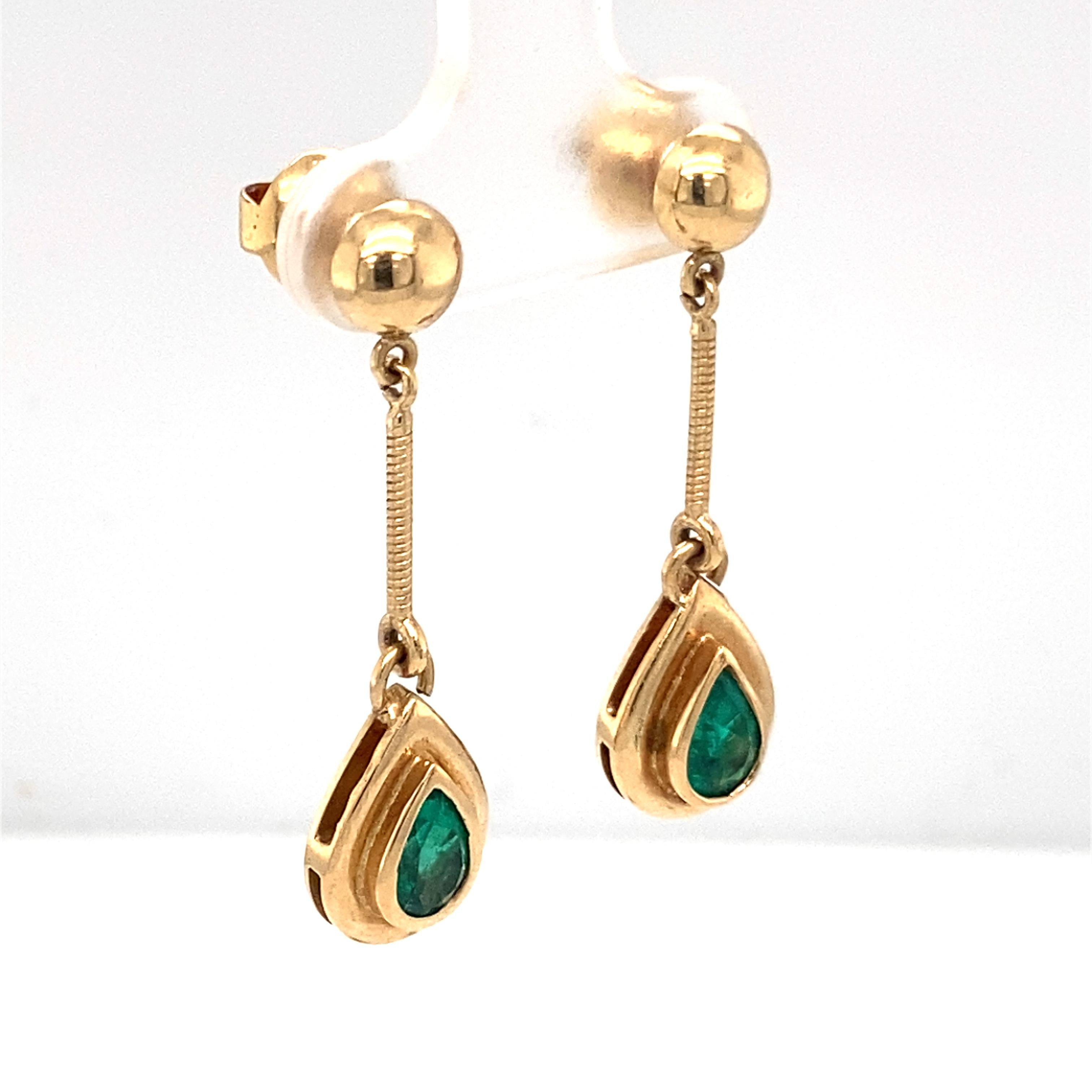 Pear Cut 2 Carat Emerald Drop Earrings in 18 Karat Yellow Gold For Sale