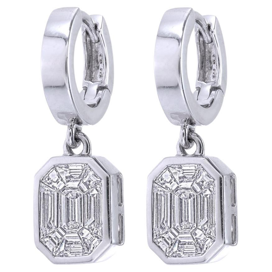 2 carat face up Bezel set emerald piecut diamond suspended on a gold ring