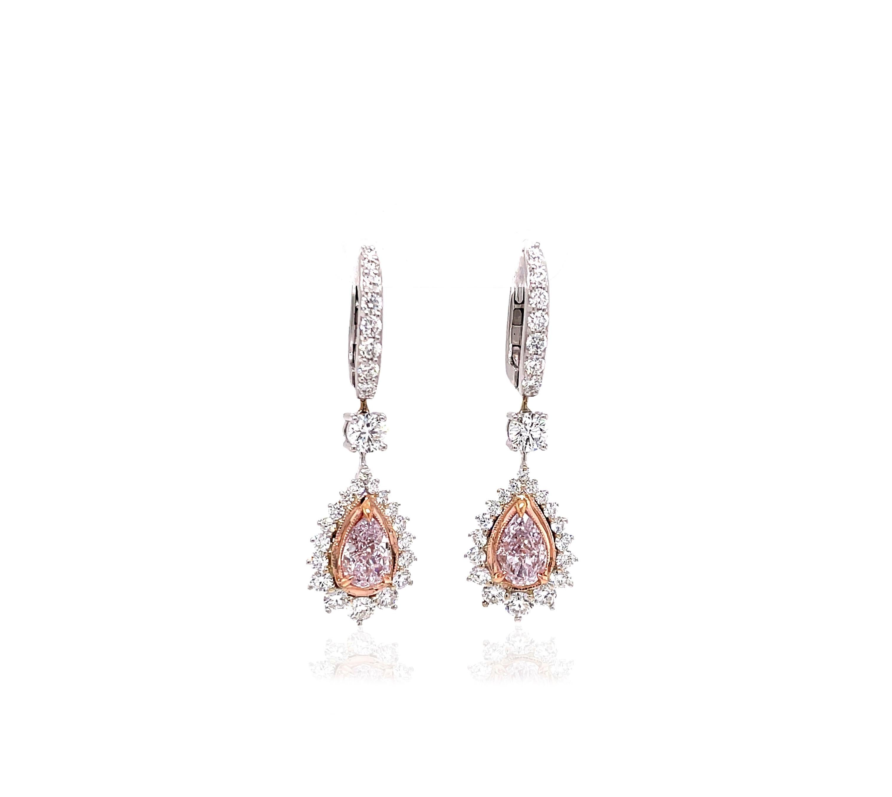 Novel Collection showcasing an exquisite set of Victorian Style Drop Diamond Earrings, highlighting a central duo of impeccably matched pear-cut, Light Pink diamonds with a combined weight of 2 Carats. These pink diamonds have been GIA certified as