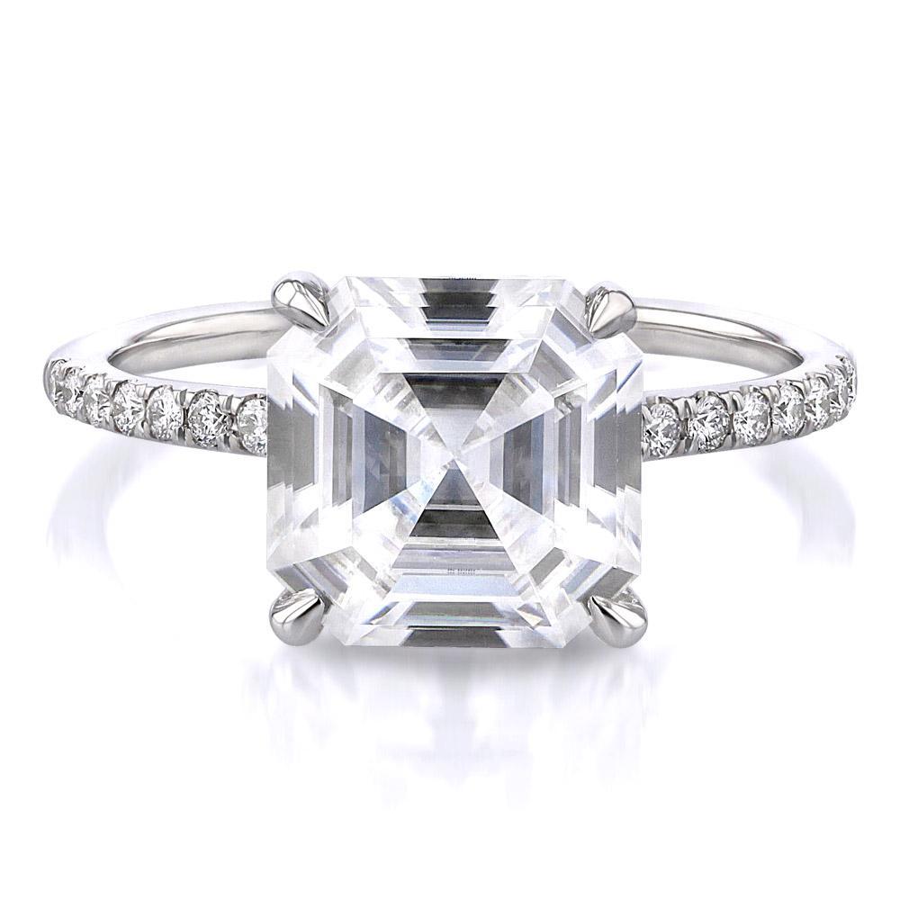 The center is 2 carat GIA certified asscher cut J VS, mounted in platinum 950, with the side diamonds of 0.40 carat. 
Could be order in white gold, rose gold as well as yellow gold.