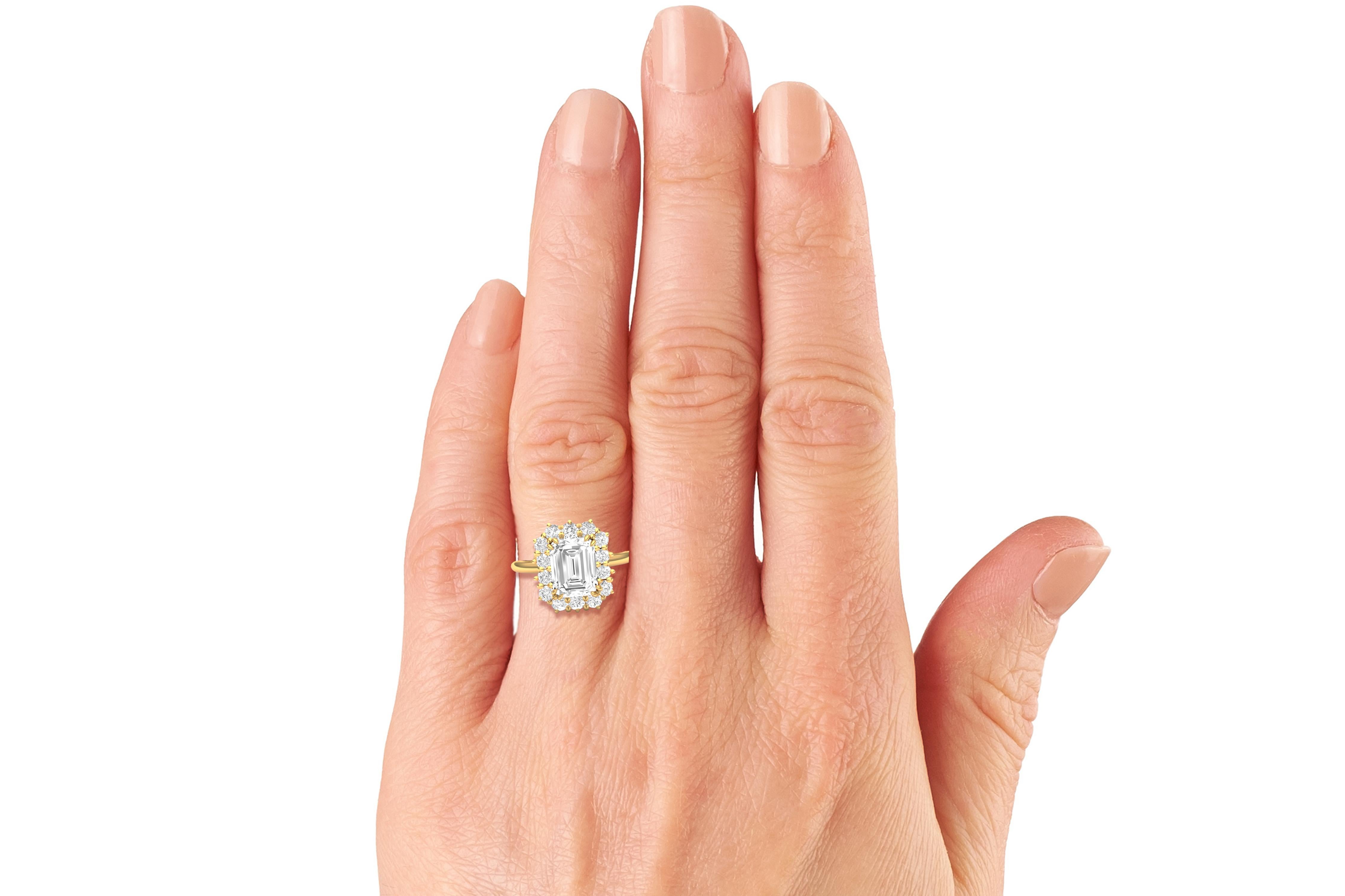 A stunning example of three prong engagement ring perfection.  The center stone is a GIA Certified 2 carat Emerald Cut K-VS2.  The center stone is accented by 3mm .10 carat each round brilliant diamonds which have a color and clarity of the center