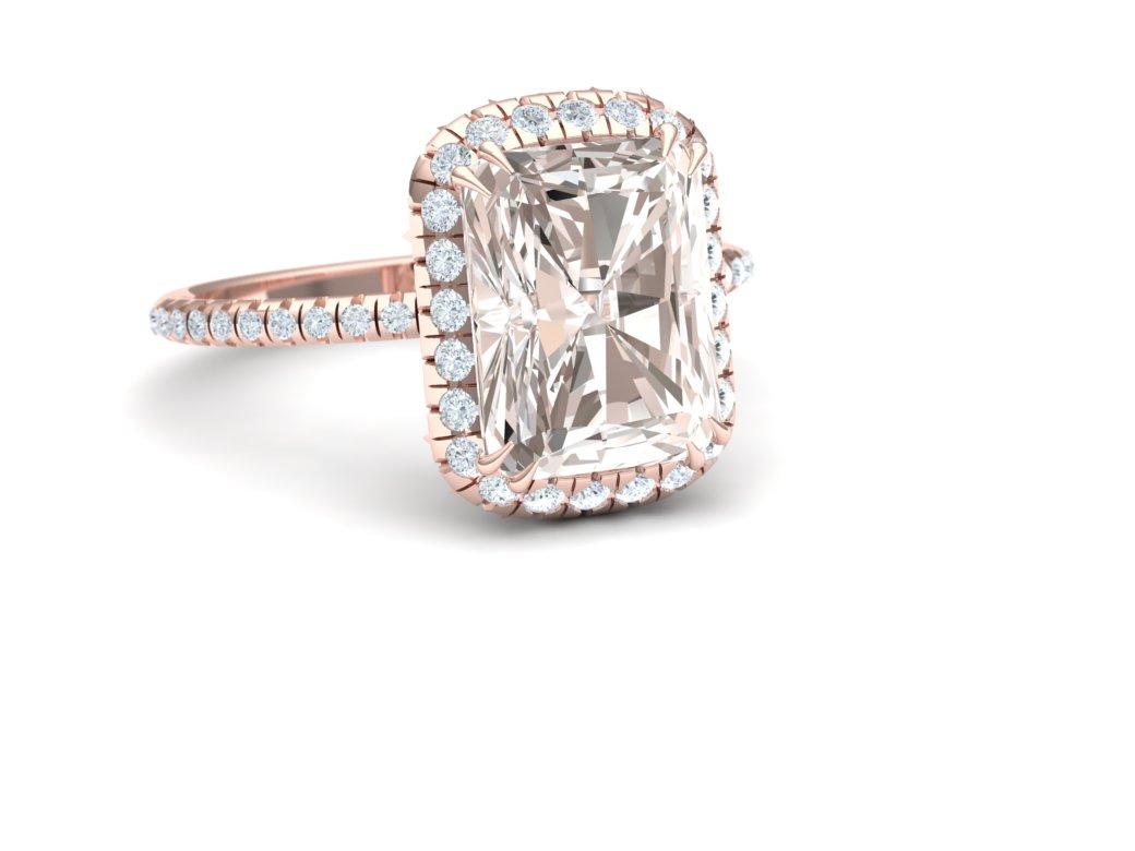 This Stunning Radiant rose gold diamond ring has such a gorgeous color profile.  This stone is rare because the color is reflects.  Normally a L color is nothing that special, but every once in a while you get lucky and have a stone that immolates a