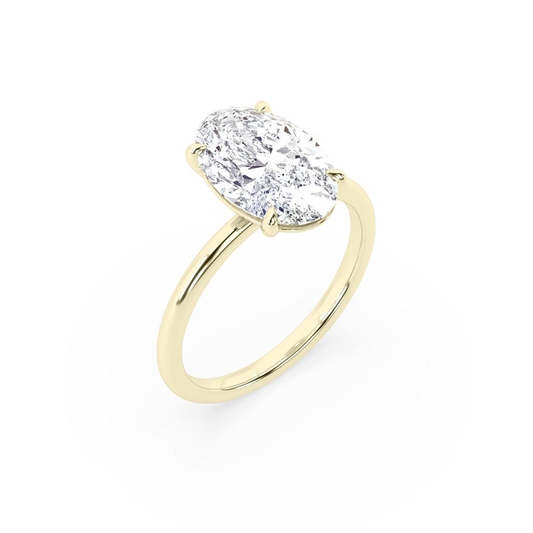 Contemporary 2 Carat Oval Solitaire Diamond 14k Yellow Gold Engagement Ring For Sale