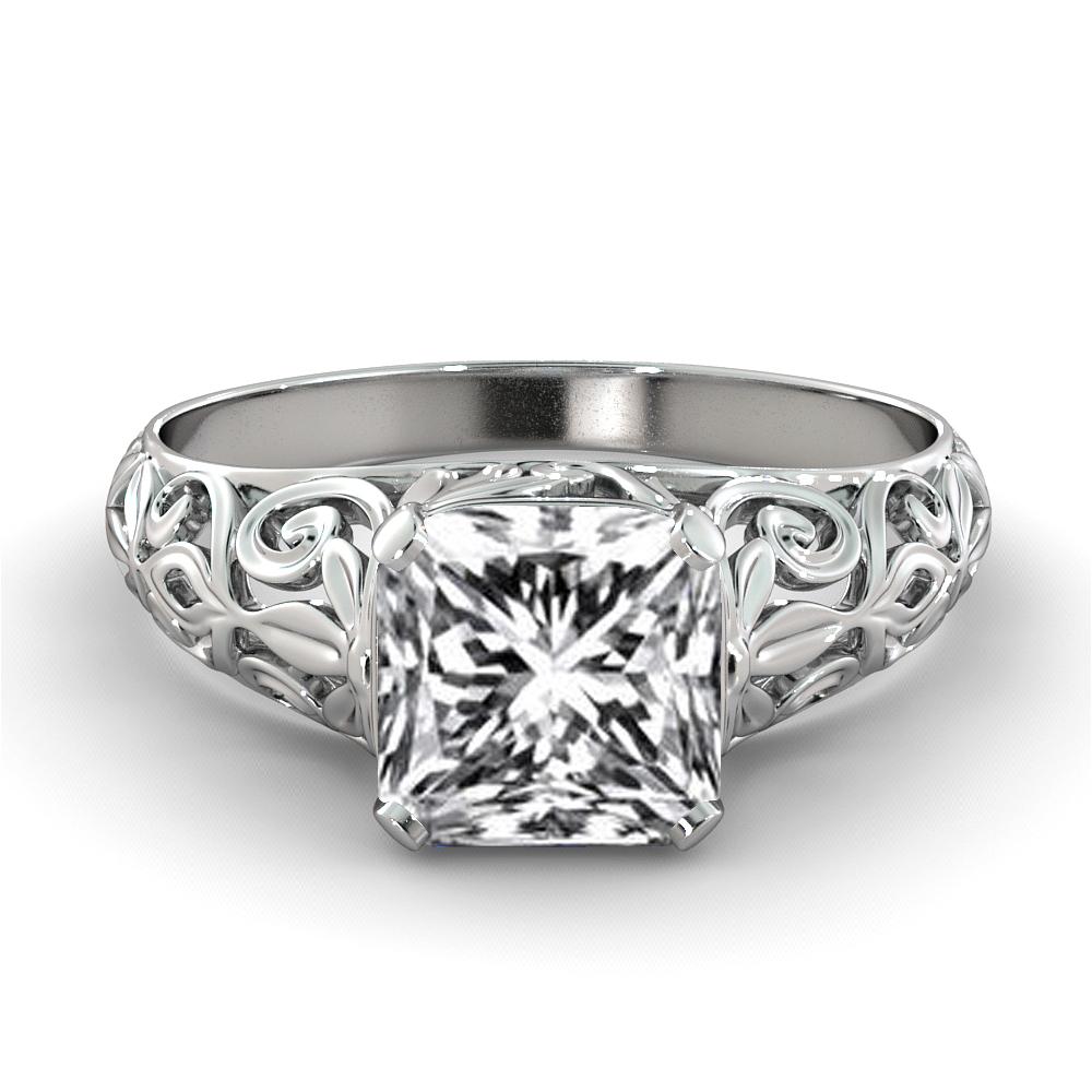 This stunning vintage design ring features a solitaire GIA certified diamond. Center stone is 100% eye clean, natural 2 carat, cushion shaped diamond of F-G color and VS2-SI1 clarity. Set in a sleek, 18K white gold, solitaire ring with a 4-prong