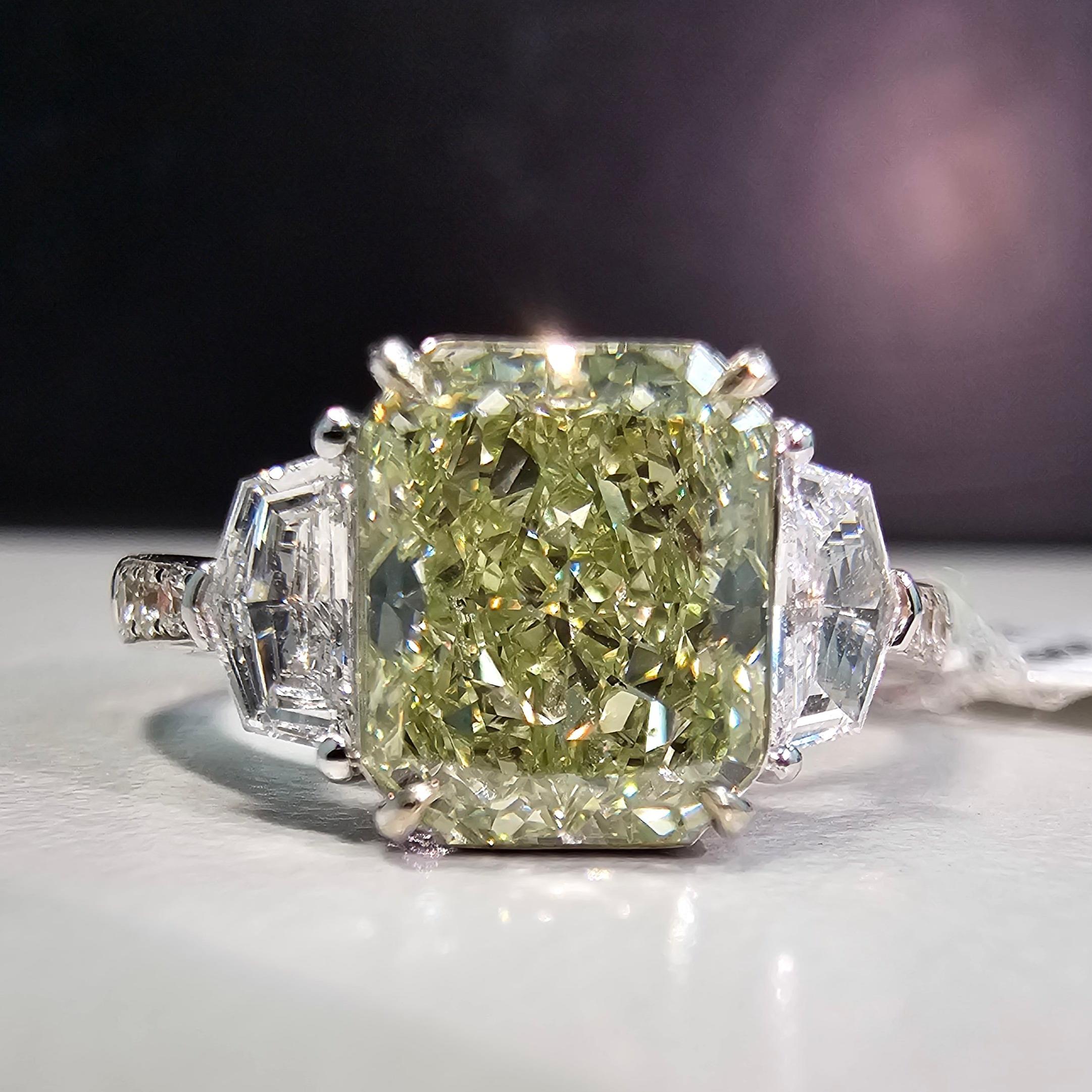 Our new line of diamonds with flavors of green in them set in a ring with green painted enamel under the diamond to make it appear as a pure green diamond. The diamond is 100% natural and GIA certified, but the ring is colored underneath the stone