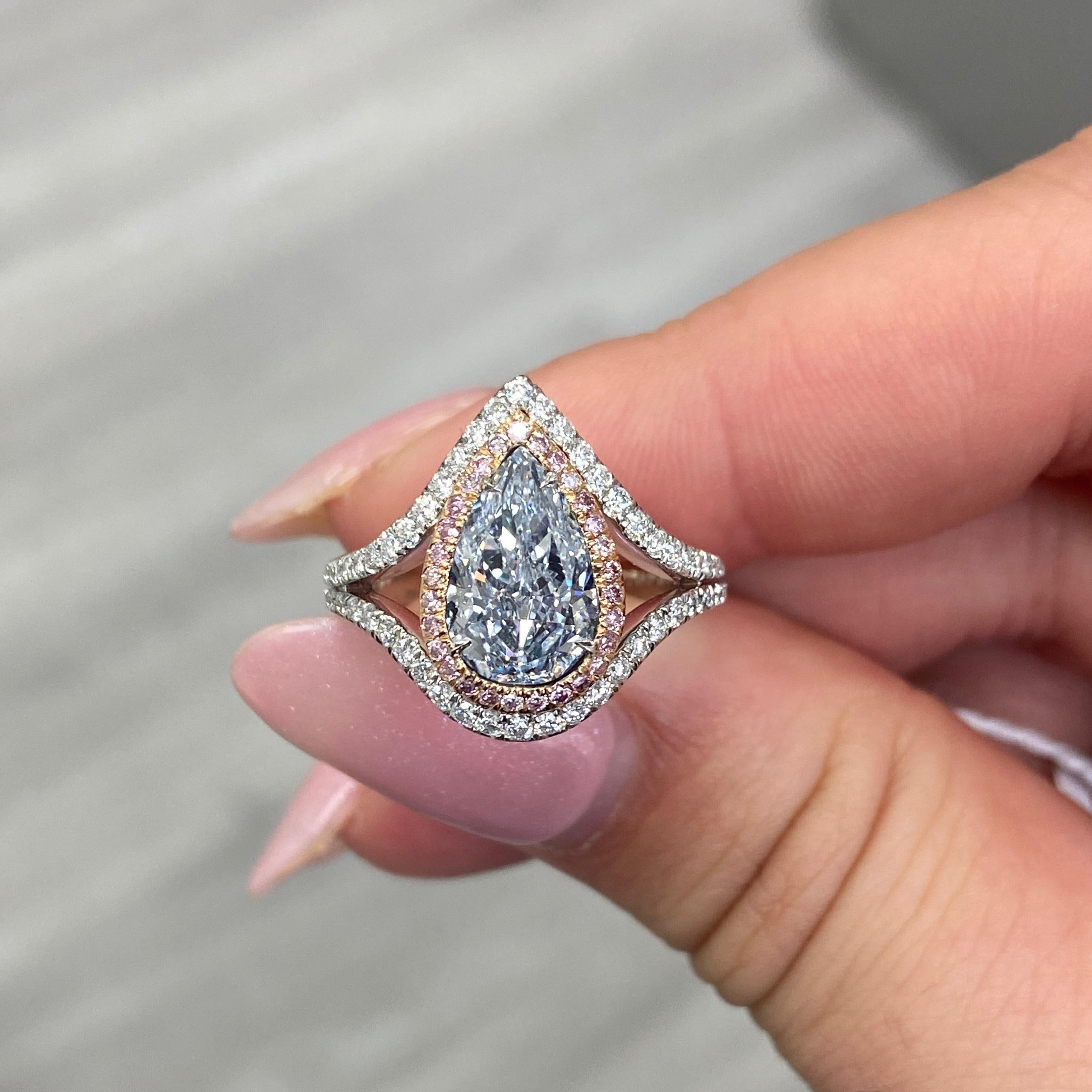 - Exceptionally gorgeous 2.13ct GIA Very Light Blue Pear shape white gorgeous color and a beautiful pear model 1.59 ratio
- Set in Platinum and Rose Gold with 0.96ct of pink and white diamonds
 2.13 carat center blue diamond
Very Light Blue
Pear