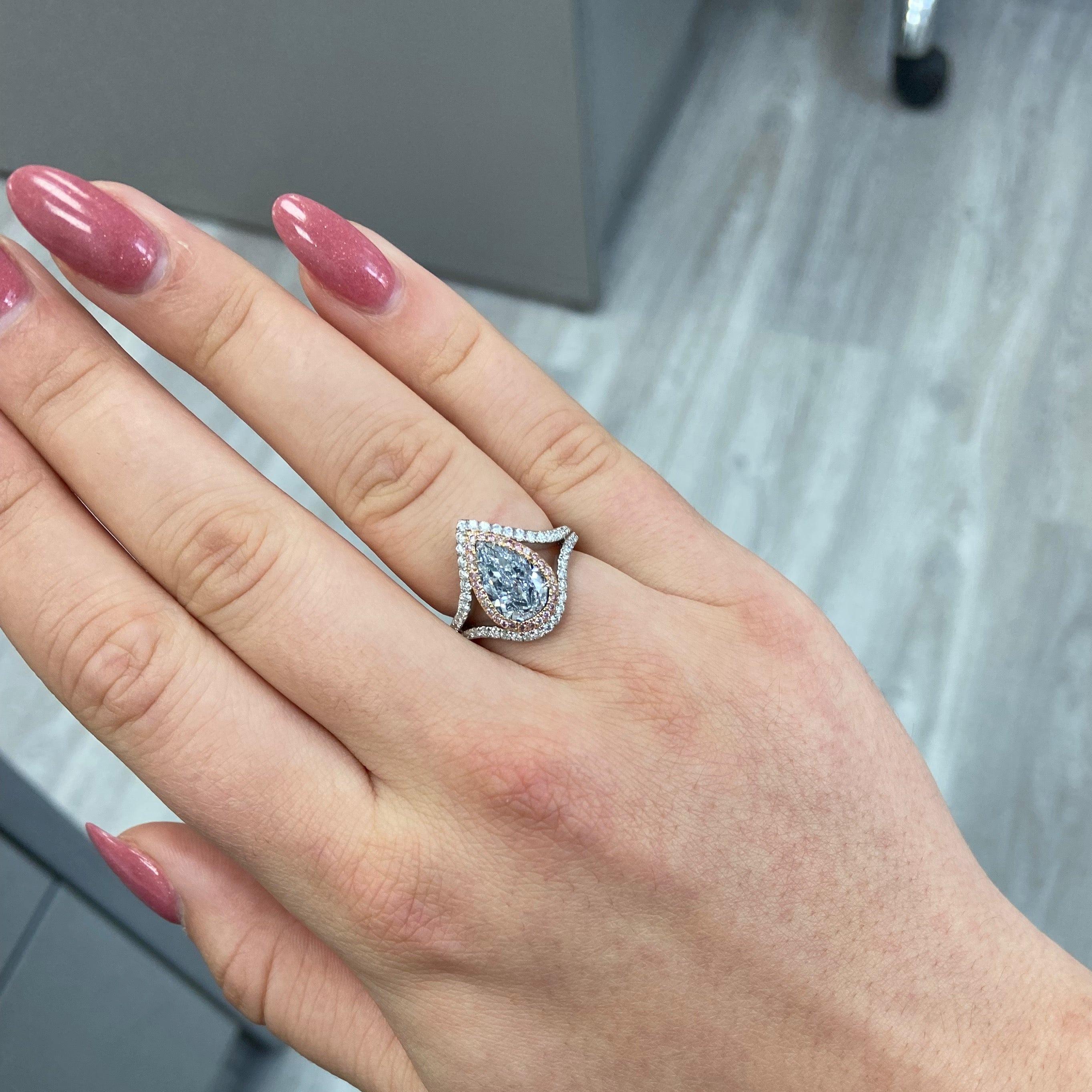 Pear Cut 2 Carat GIA Very Light Blue VVS2 Diamond Ring For Sale